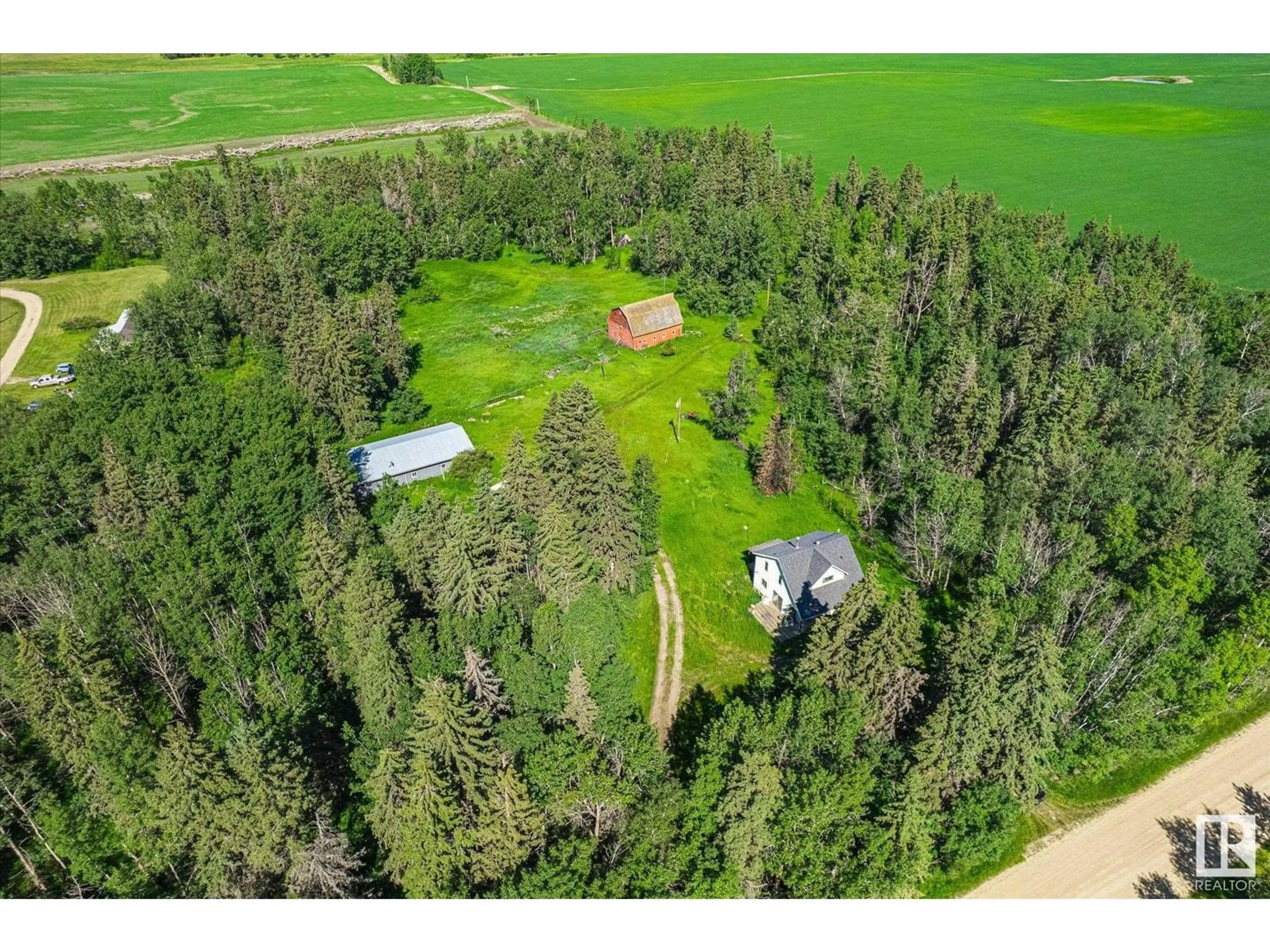 A pic from outside/outdoor area/front of a property/back of a property/a pic from drone, forest/trees view for 452078 RGE ROAD 275, Rural Wetaskiwin County Alberta T0C0C0