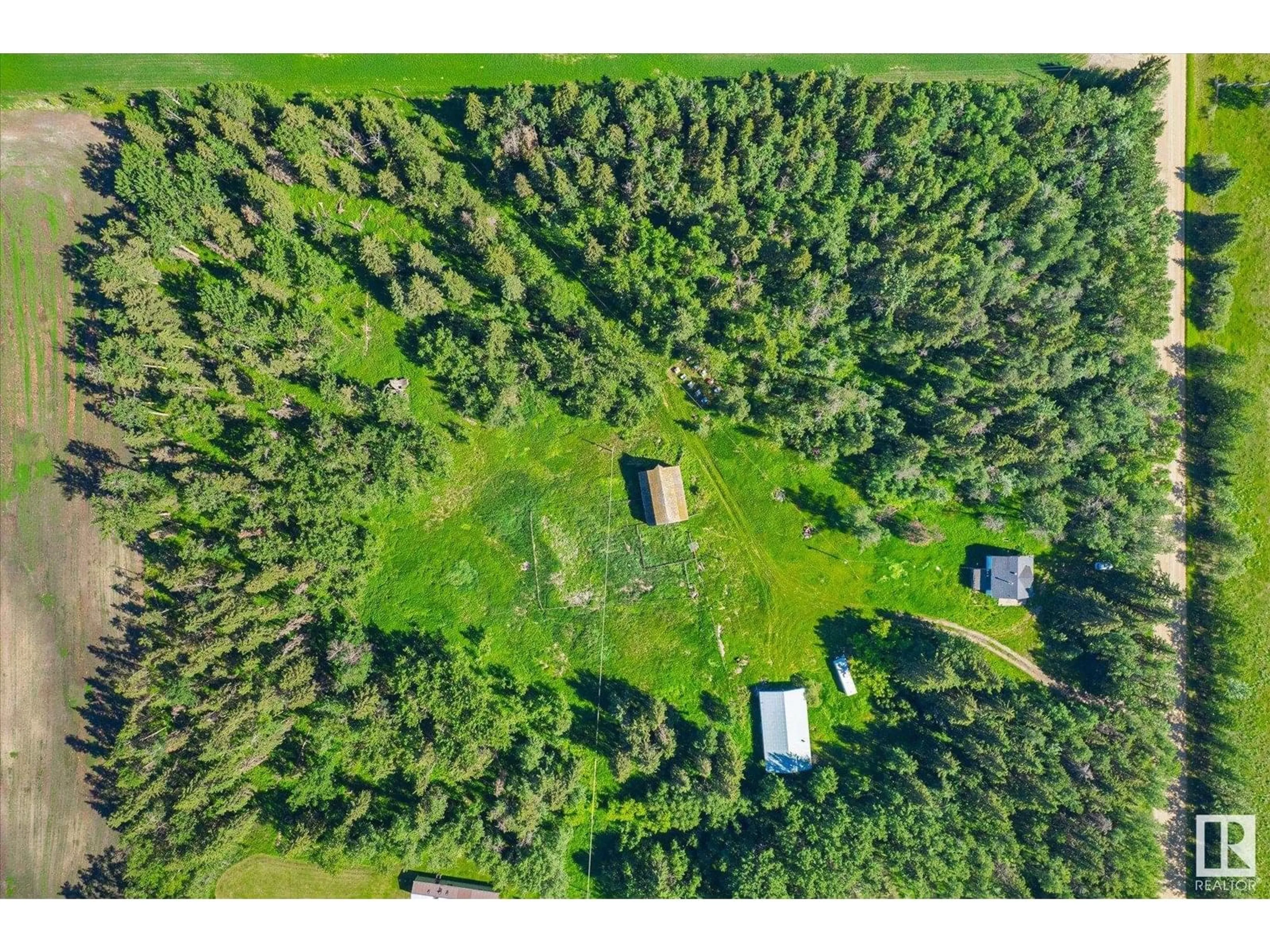 A pic from outside/outdoor area/front of a property/back of a property/a pic from drone, forest/trees view for 452078 RGE ROAD 275, Rural Wetaskiwin County Alberta T0C0C0