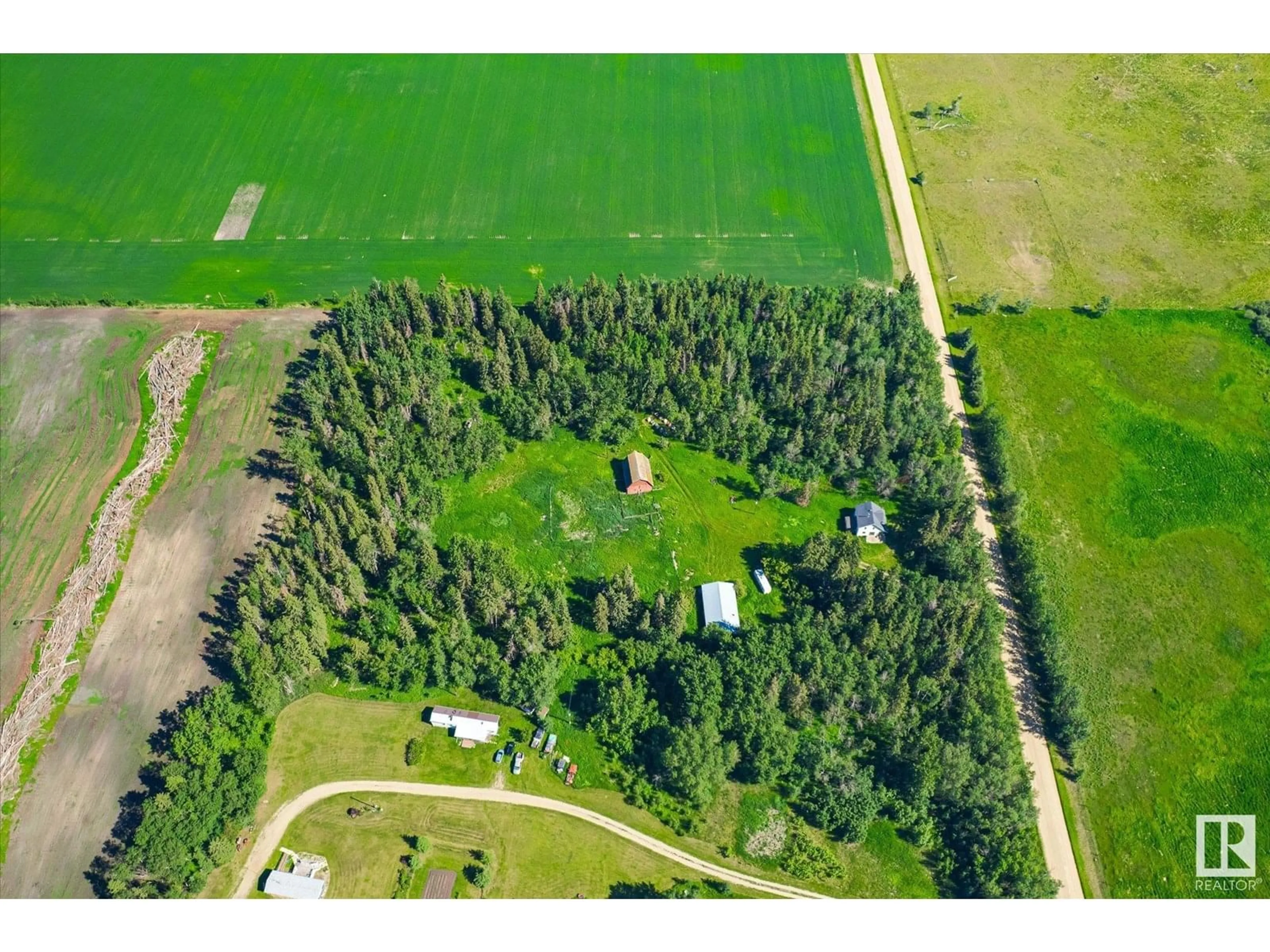 A pic from outside/outdoor area/front of a property/back of a property/a pic from drone, forest/trees view for 452078 RGE ROAD 275, Rural Wetaskiwin County Alberta T0C0C0