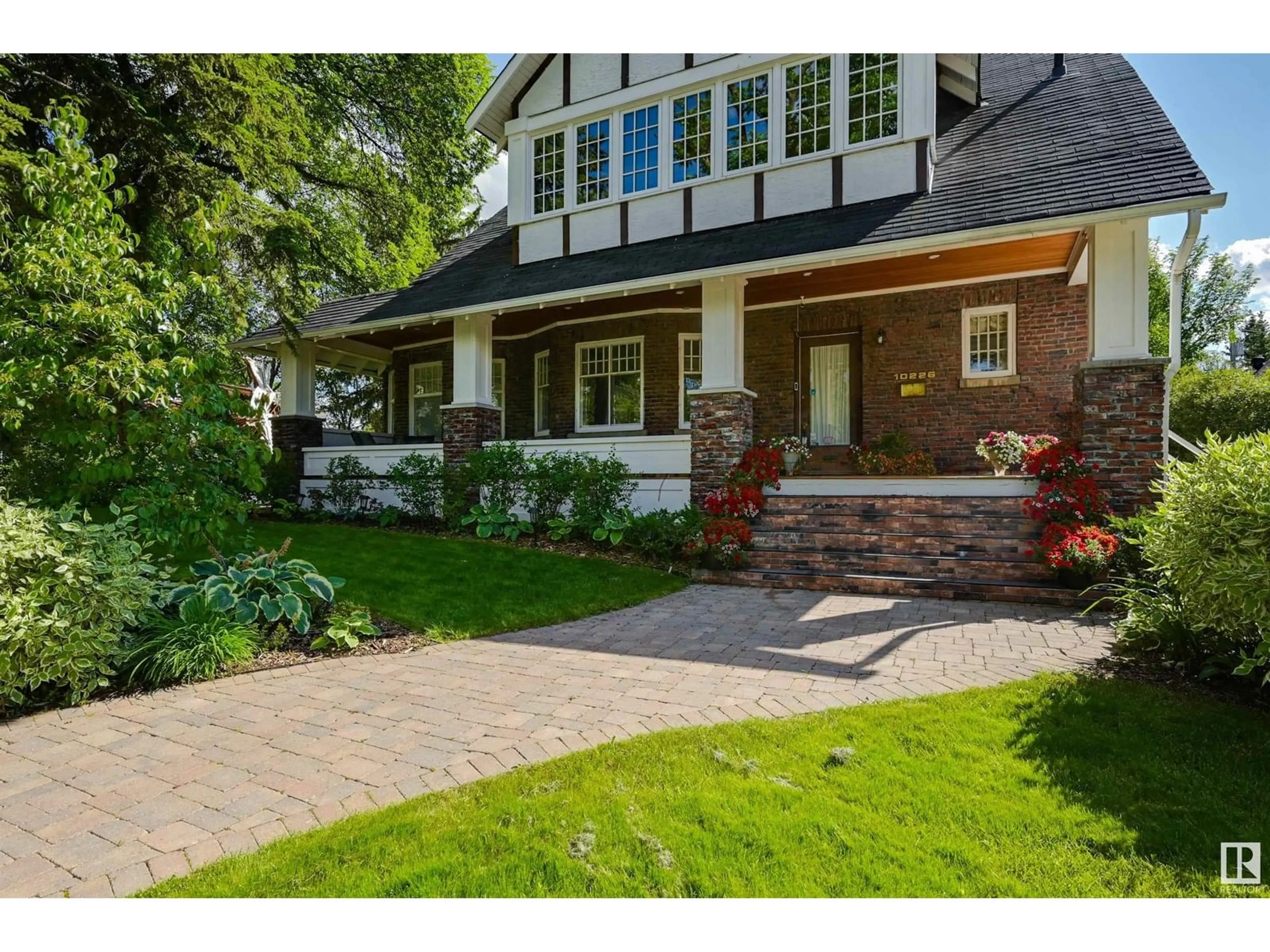 Home with brick exterior material, street for 10226 CONNAUGHT DR, Edmonton Alberta T5N3J2