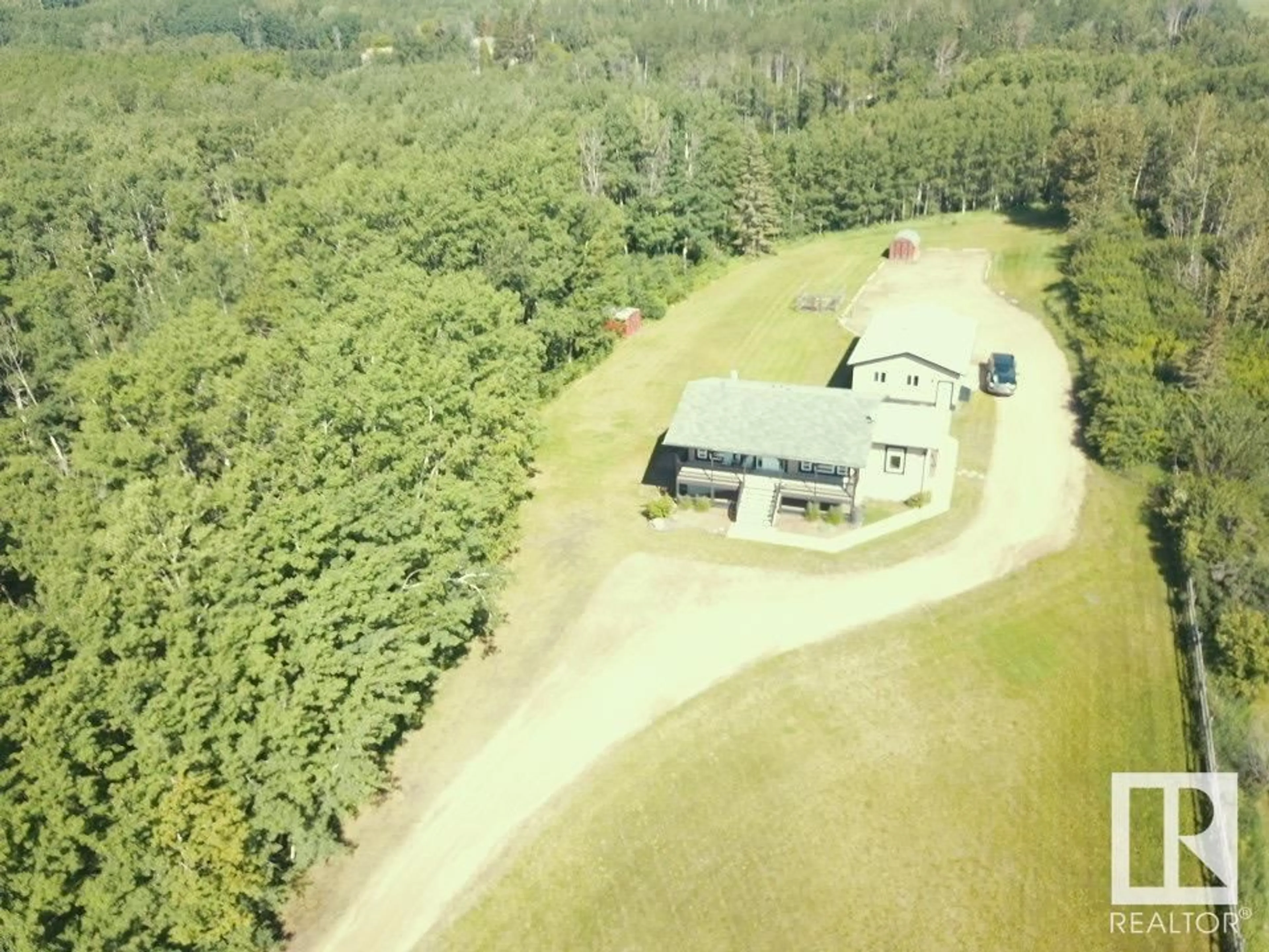 A pic from outside/outdoor area/front of a property/back of a property/a pic from drone, building for 327 - 50419 RANGE ROAD 203, Rural Beaver County Alberta T0B4J0