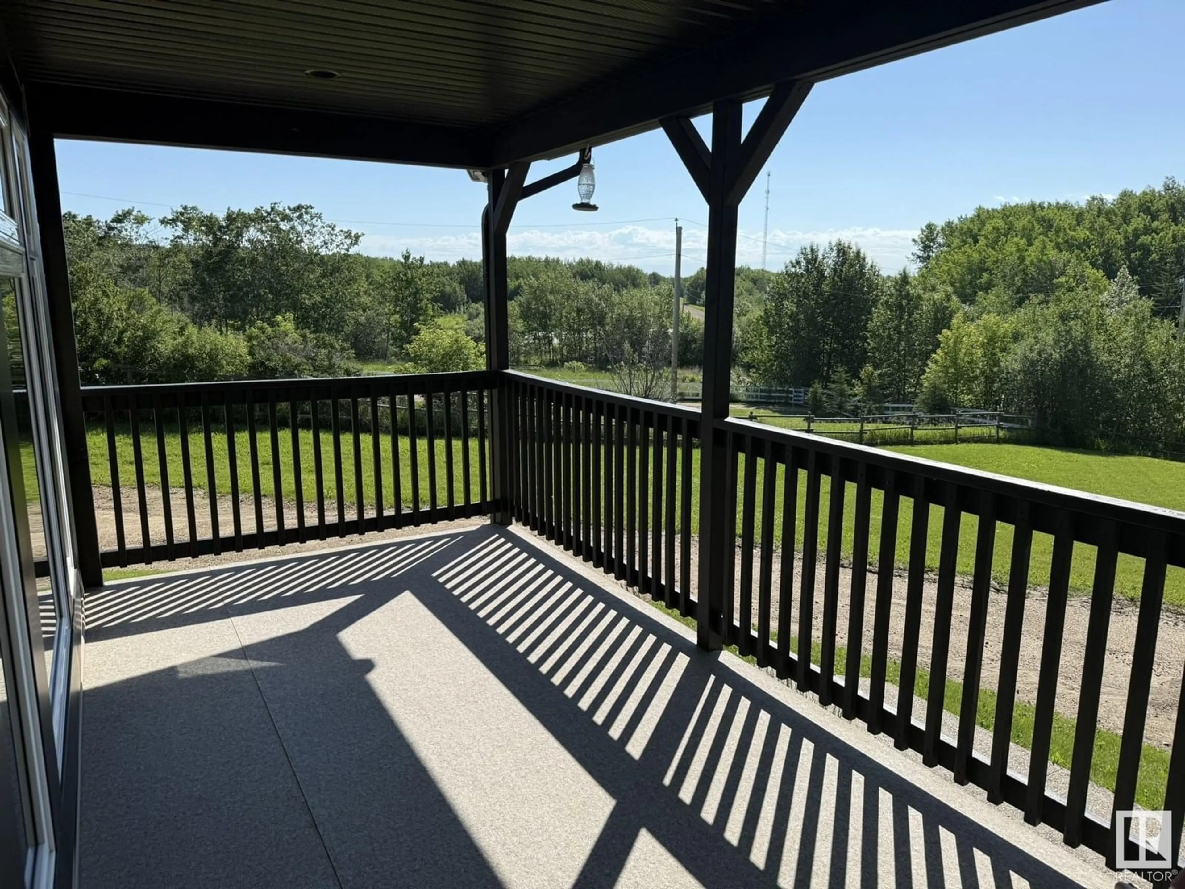 Patio, water/lake/river/ocean view for 327 - 50419 RANGE ROAD 203, Rural Beaver County Alberta T0B4J0