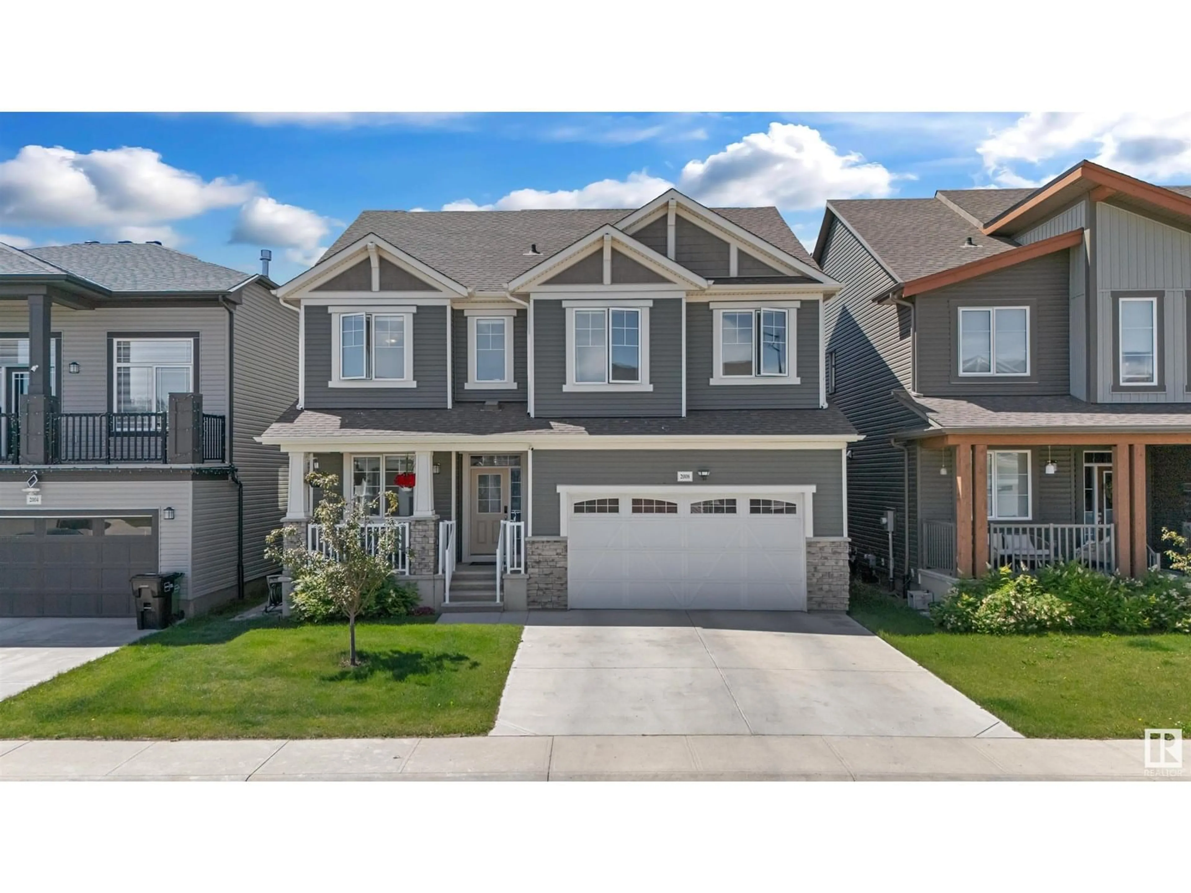 Home with vinyl exterior material, street for 2008 206 ST, Edmonton Alberta T6M1M7