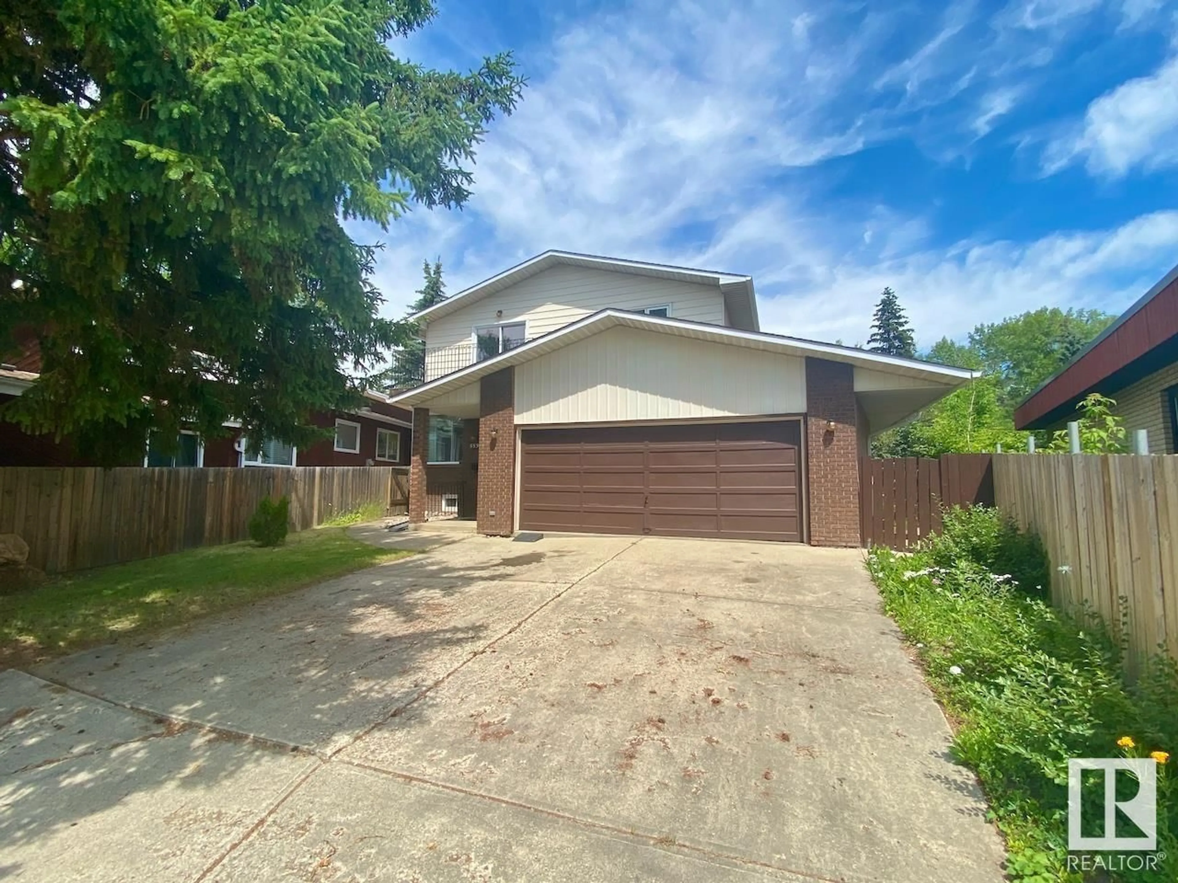 A pic from outside/outdoor area/front of a property/back of a property/a pic from drone, street for 5530 145A AV, Edmonton Alberta T5A2S1