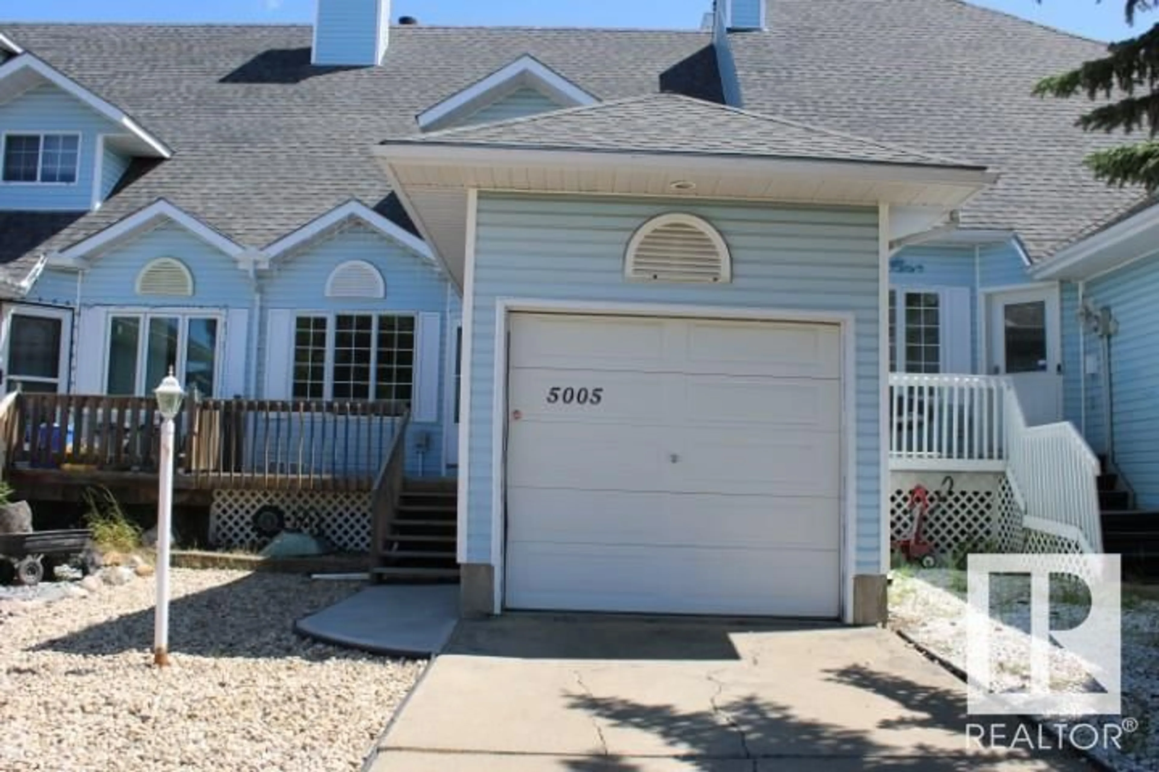 Home with vinyl exterior material, street for 5005 55 ST, Beaumont Alberta T4X1E1