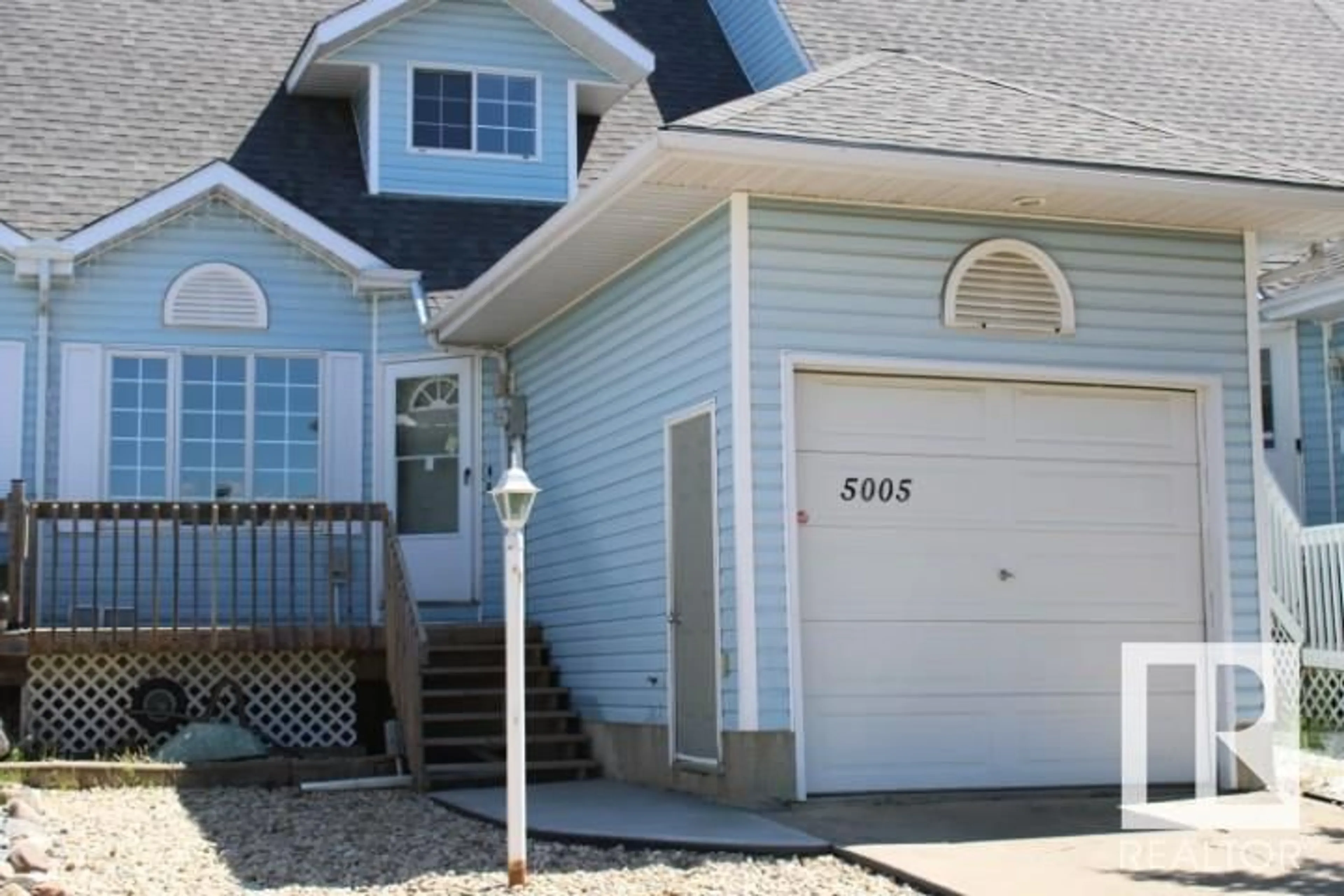 Home with vinyl exterior material, street for 5005 55 ST, Beaumont Alberta T4X1E1