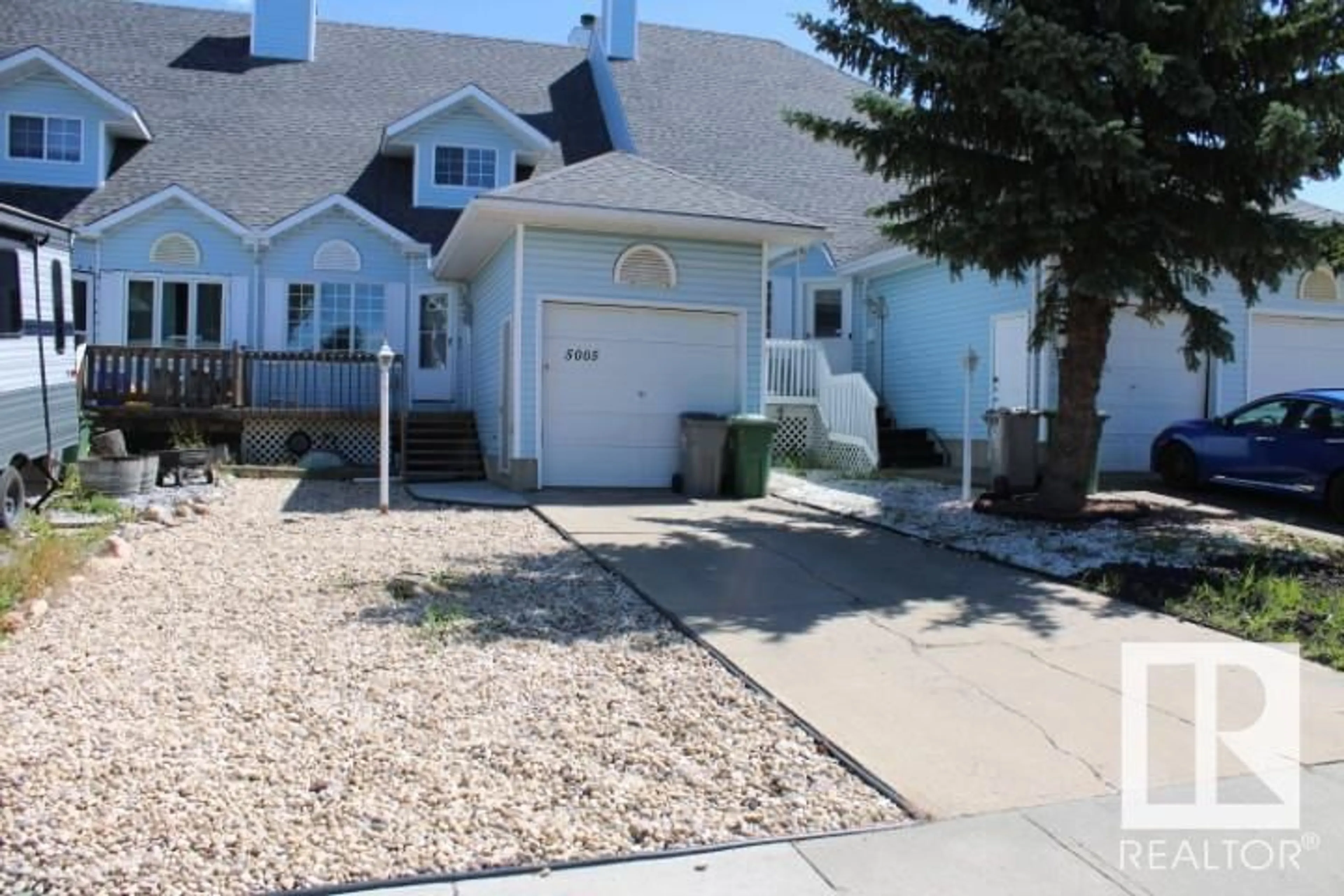 Home with vinyl exterior material, street for 5005 55 ST, Beaumont Alberta T4X1E1