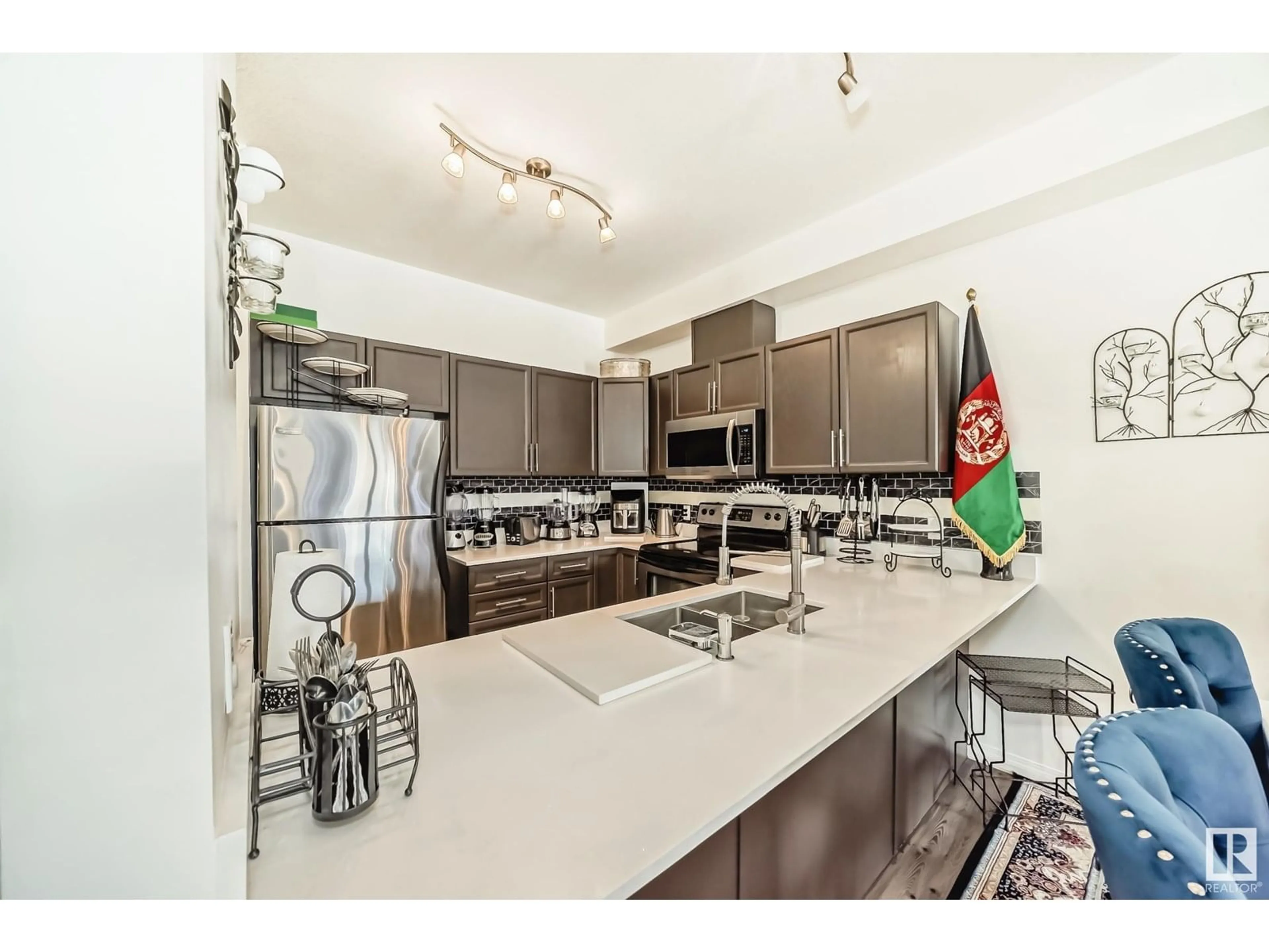 Open concept kitchen, unknown for 207 - 4316 139 AV, Edmonton Alberta T5Y0L1