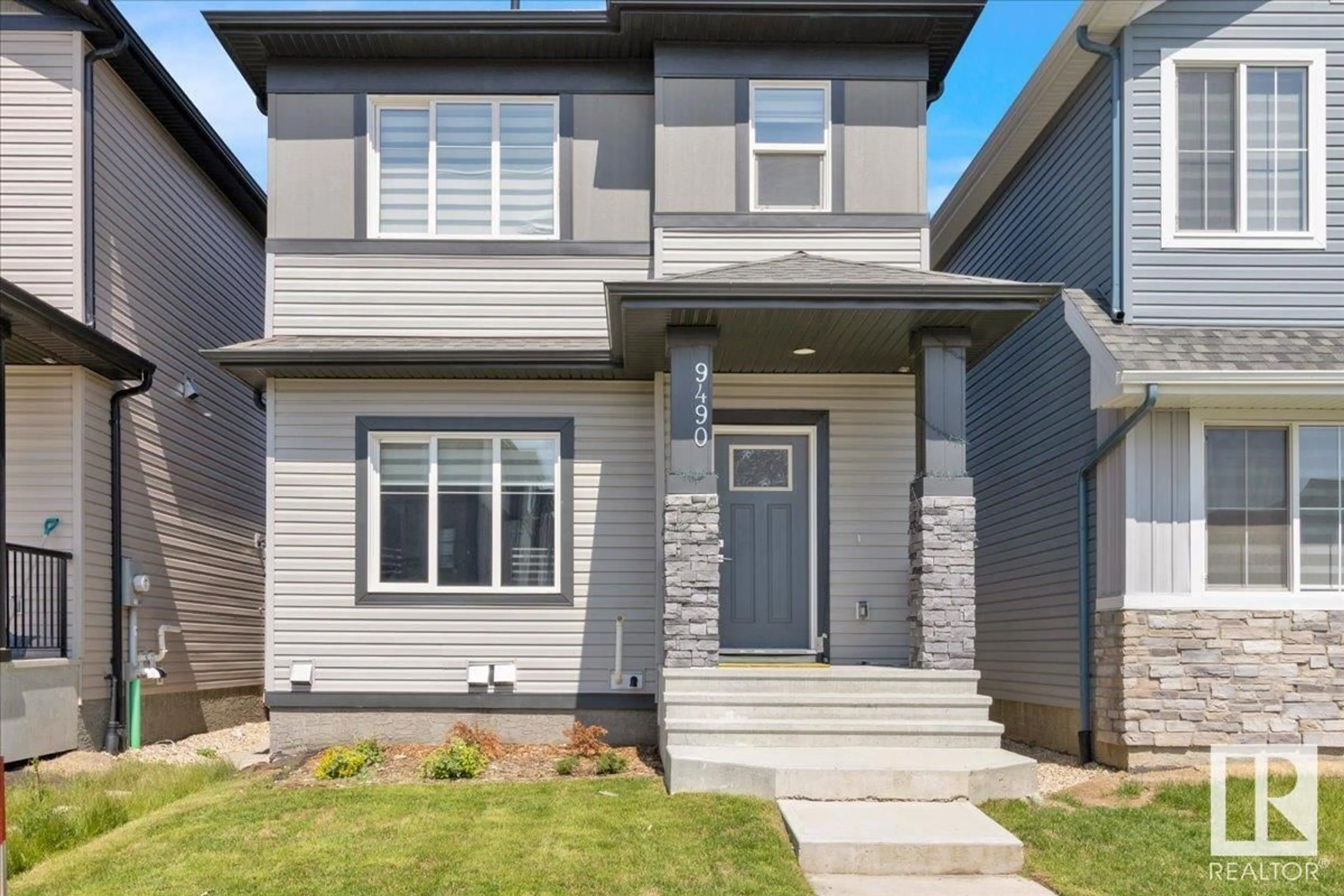 Home with vinyl exterior material, street for 9490 COLAK LN, Edmonton Alberta T6W3Y8