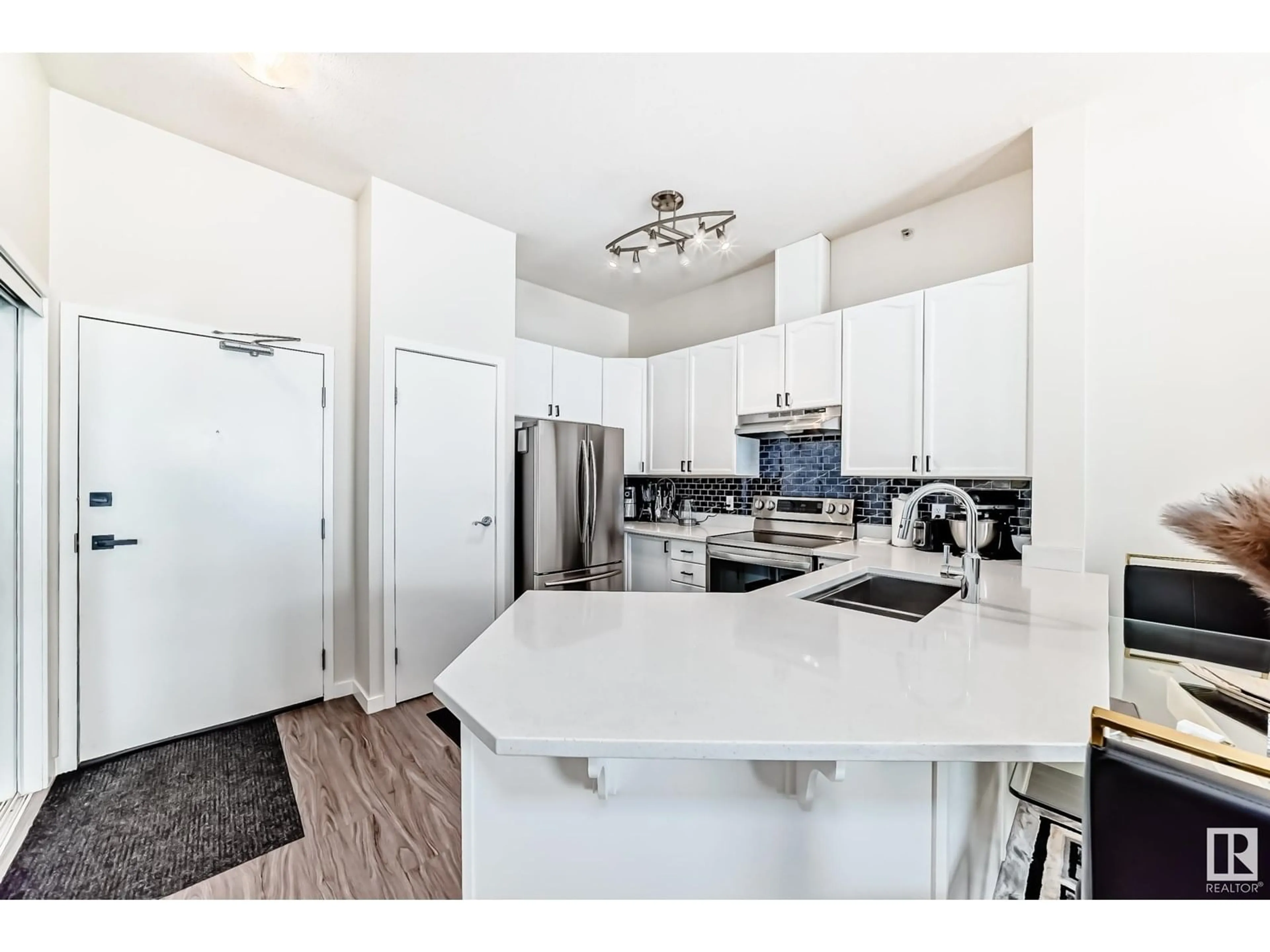 Open concept kitchen, unknown for #424 - 4312 139 AV, Edmonton Alberta T5Y3J4
