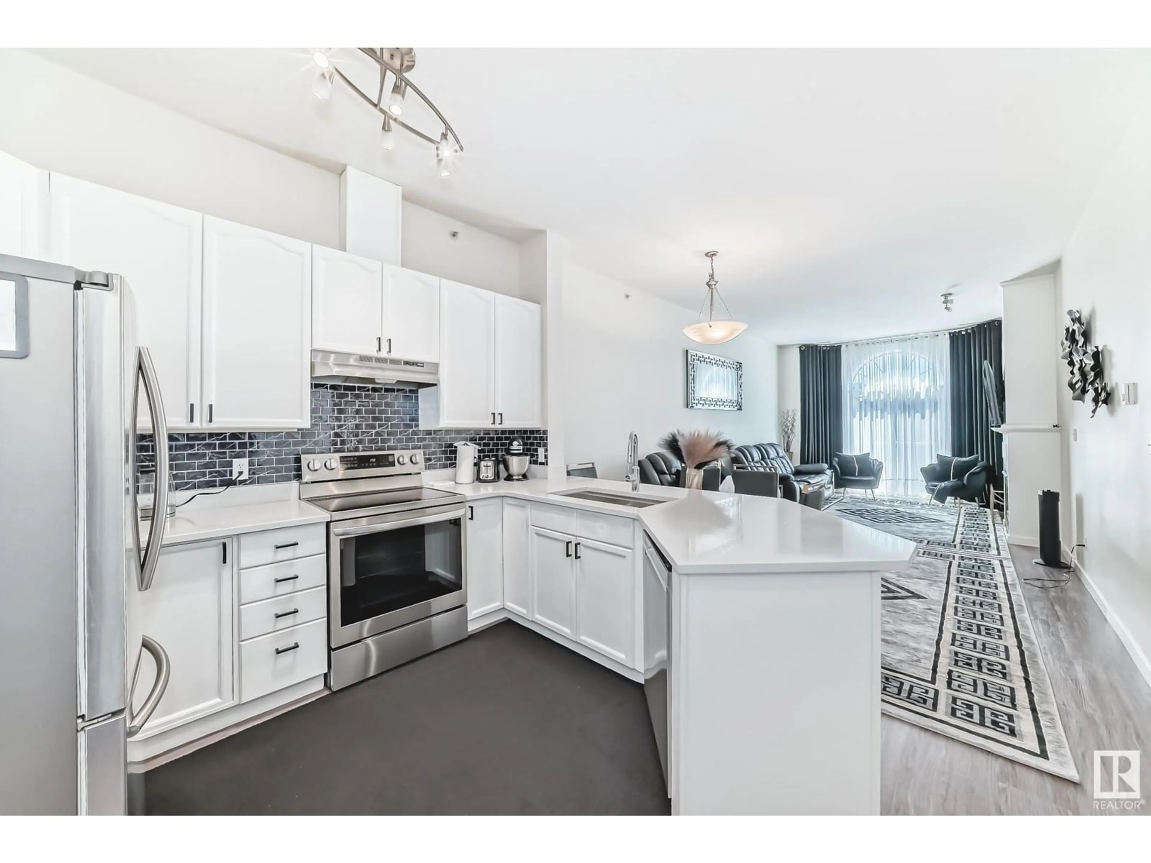 Open concept kitchen, ceramic/tile floor for #424 - 4312 139 AV, Edmonton Alberta T5Y3J4
