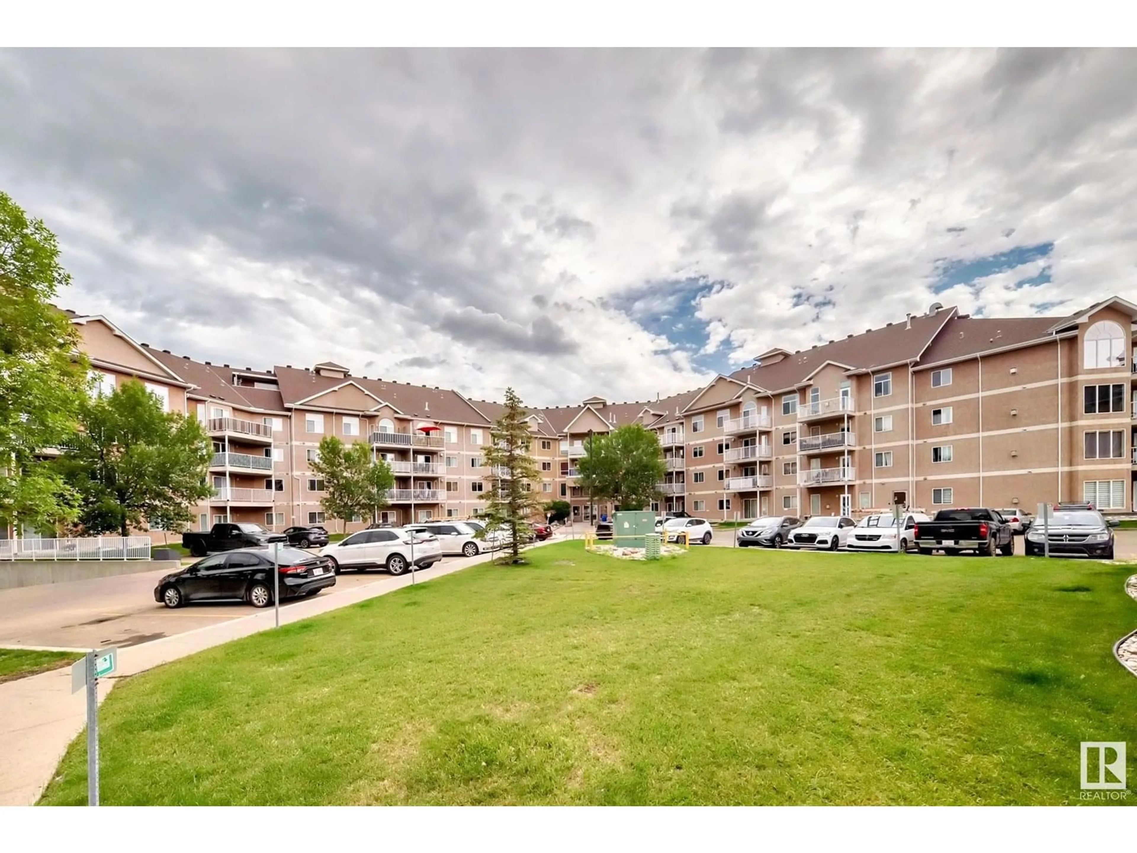 A pic from outside/outdoor area/front of a property/back of a property/a pic from drone, mountain view for #424 - 4312 139 AV, Edmonton Alberta T5Y3J4
