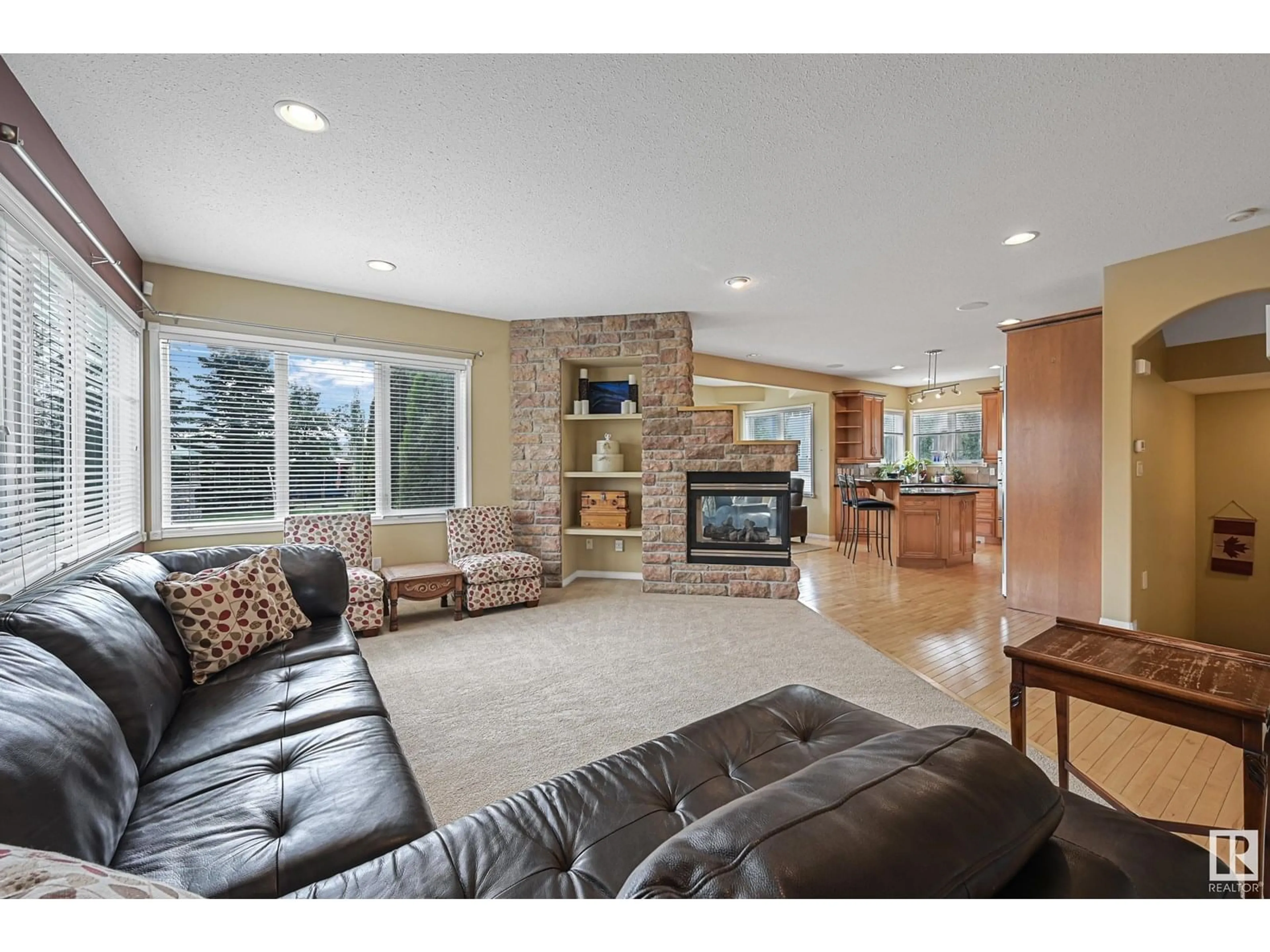 Living room with furniture, ceramic/tile floor for 1207 SUMMERSIDE DR, Edmonton Alberta T6X1C5