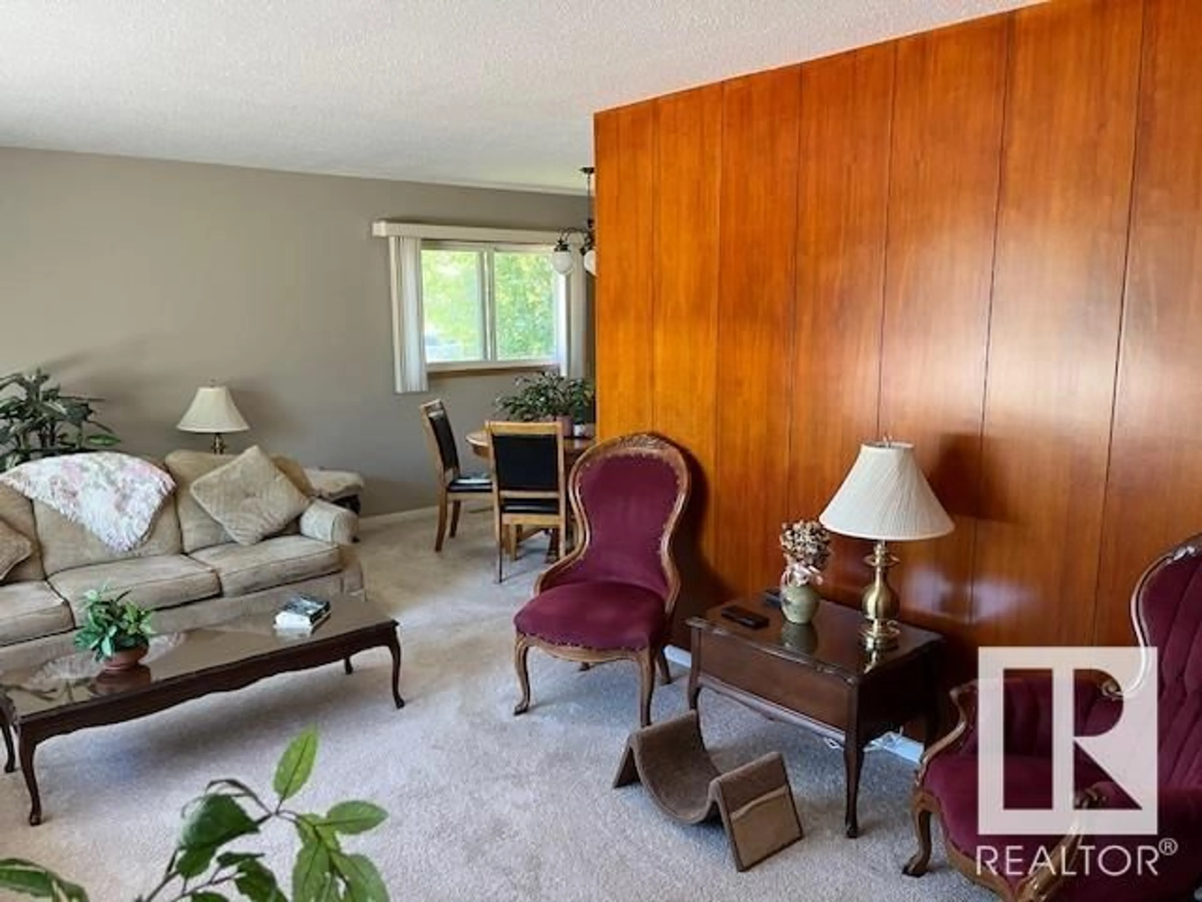 Living room with furniture, unknown for 15103 92 AV, Edmonton Alberta T5R5B7