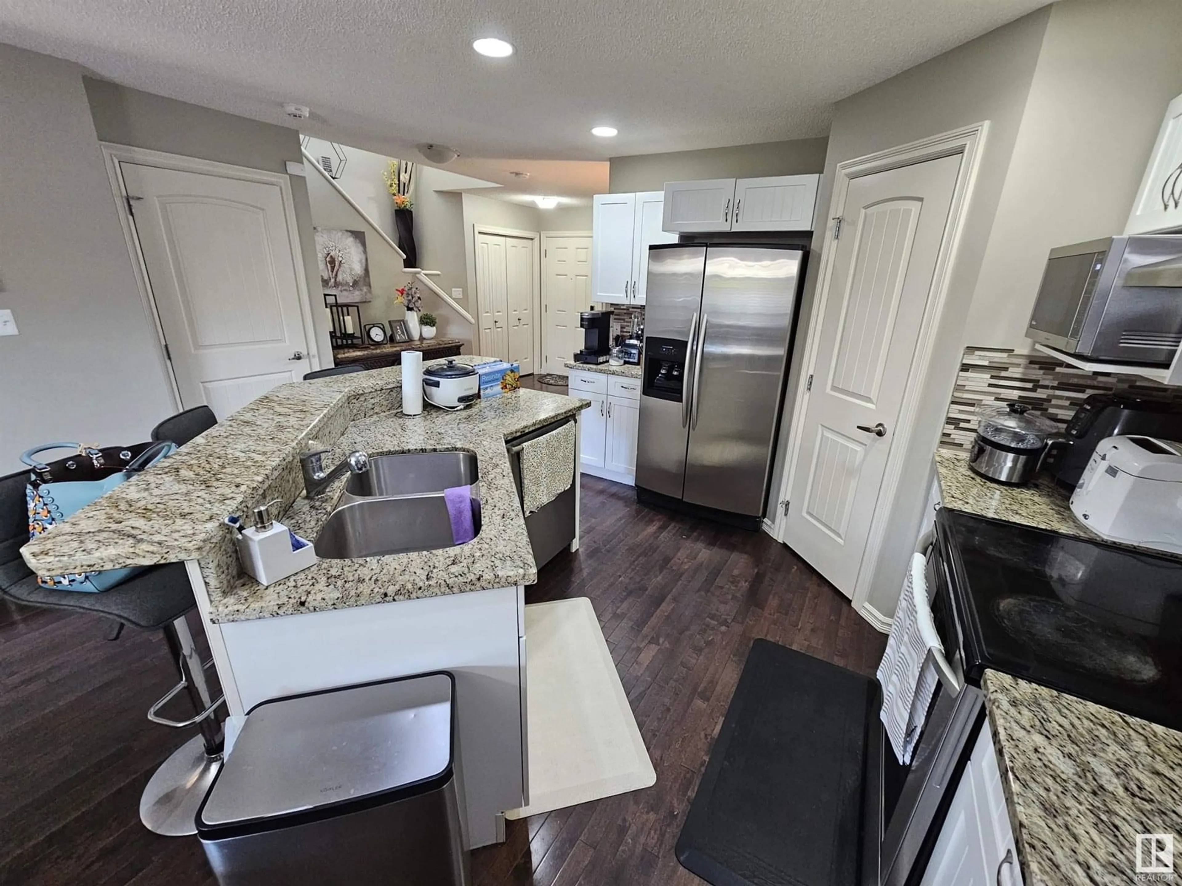 Open concept kitchen, ceramic/tile floor for 1123 36 AV, Edmonton Alberta T6T0E9