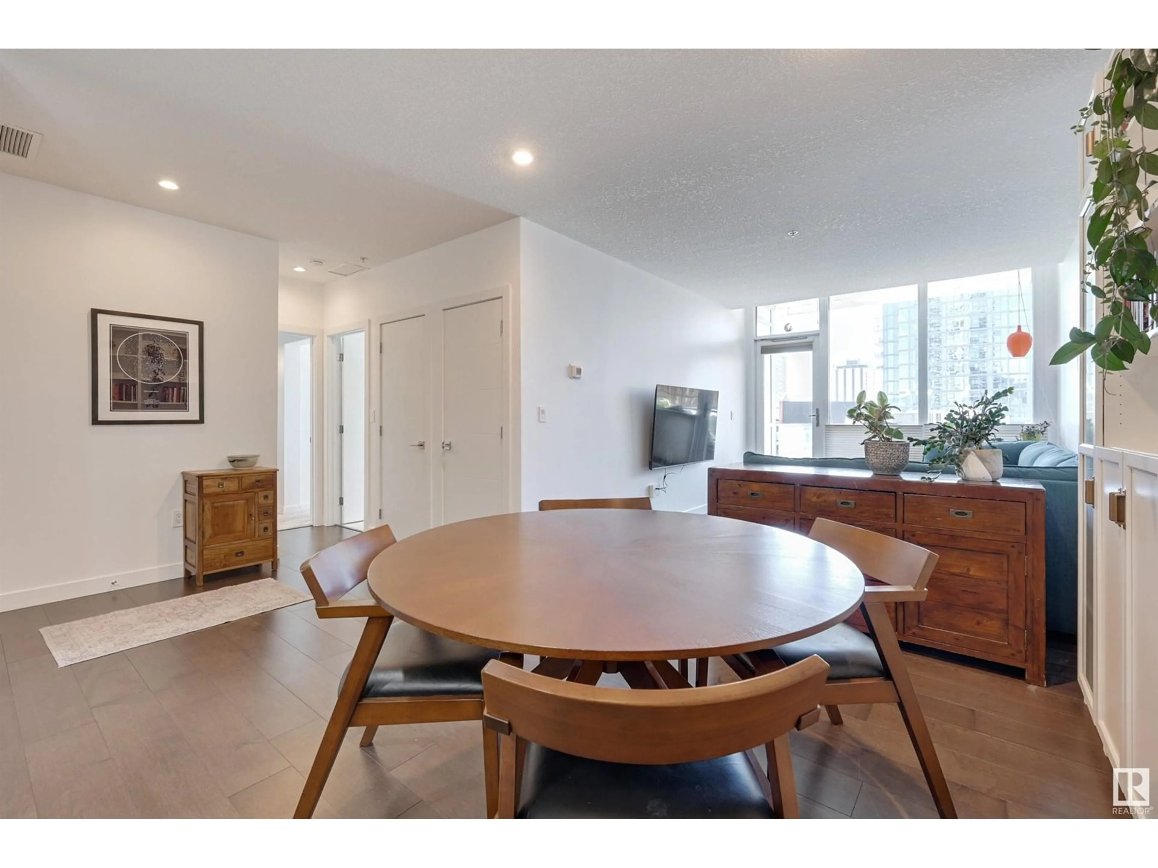 Dining room, wood/laminate floor for 610 10238 103 ST NW, Edmonton Alberta T5J0G6