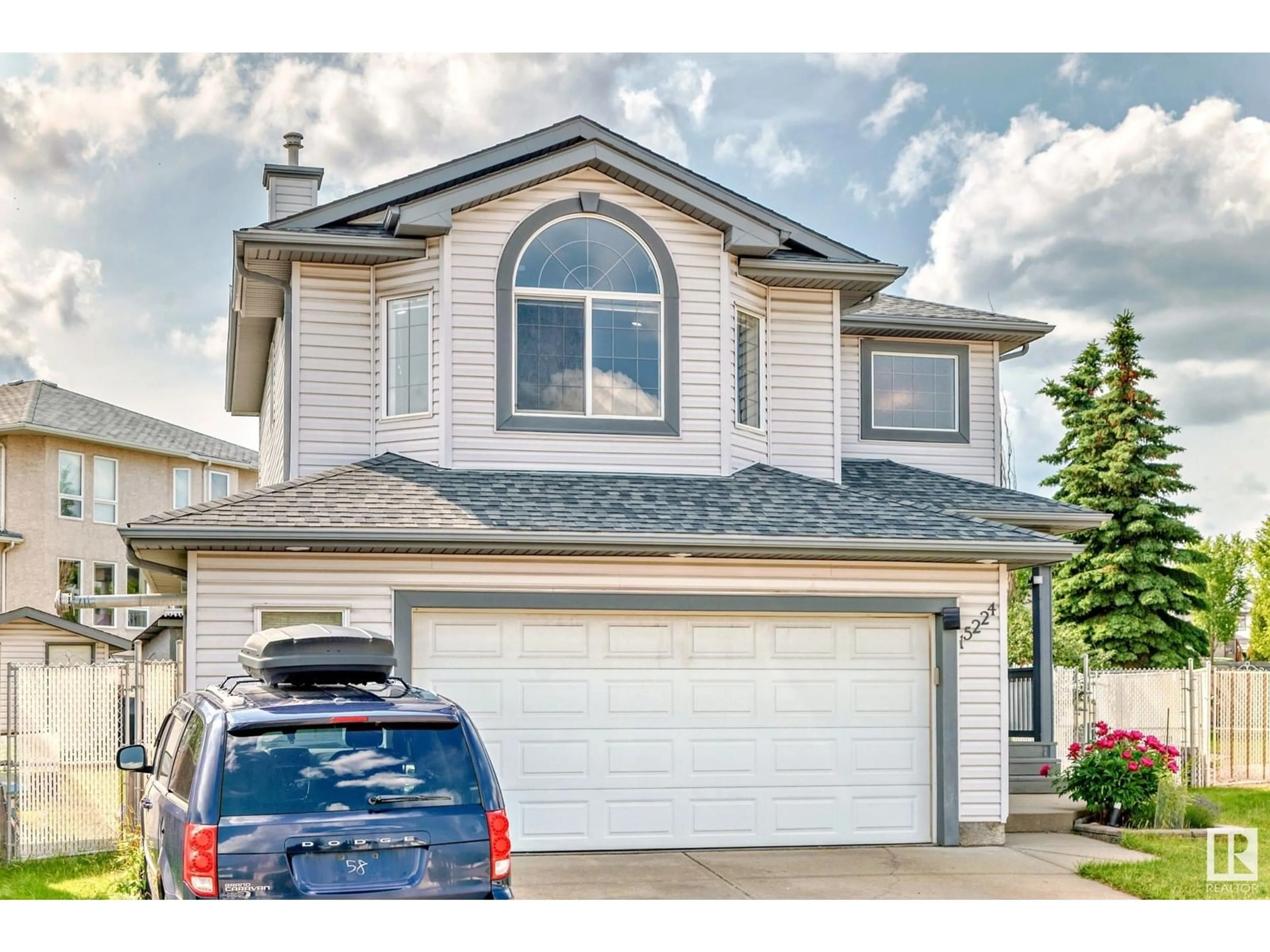 Home with vinyl exterior material, street for NW - 15224 48 ST, Edmonton Alberta T5Y3B8