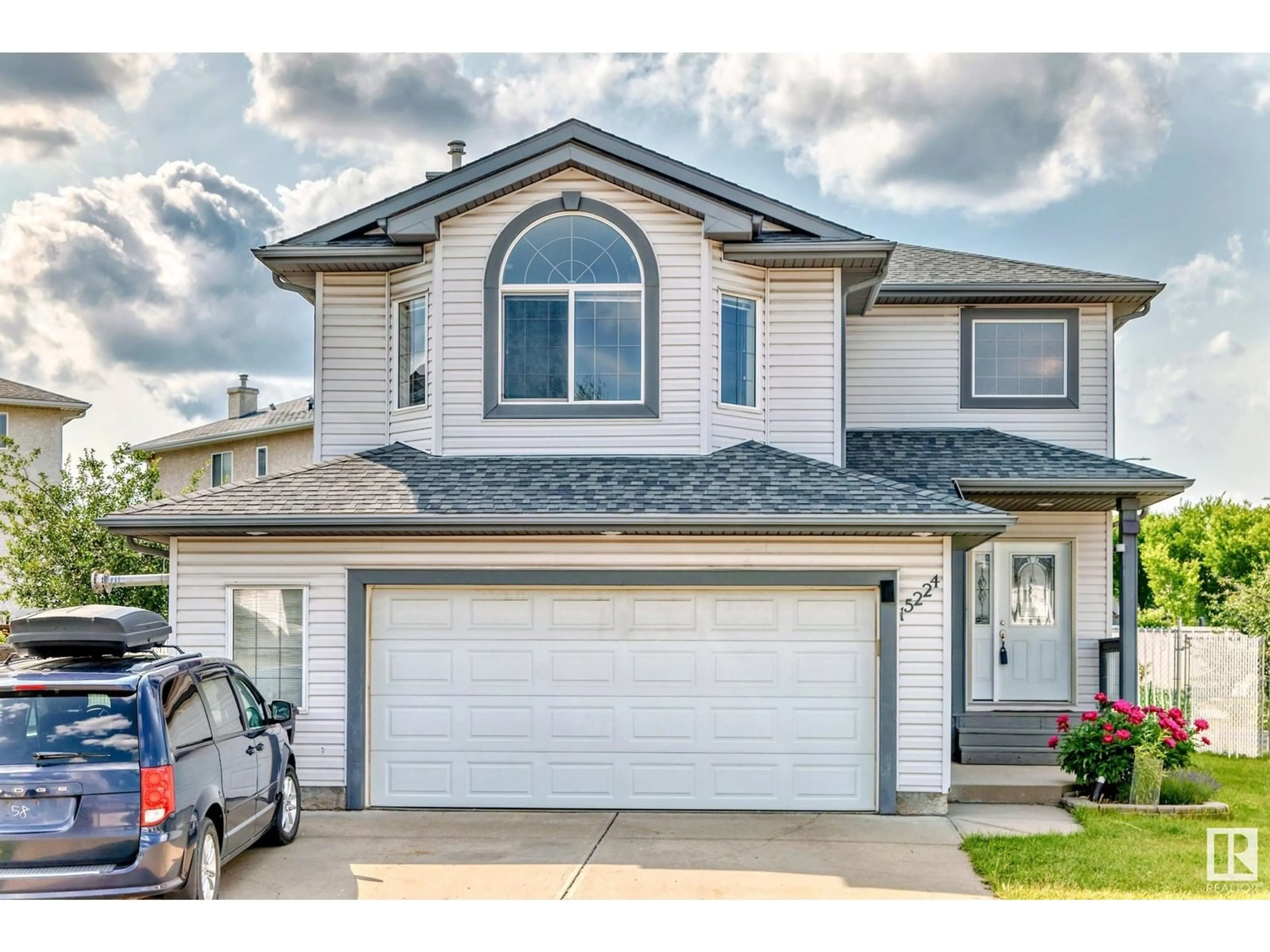 Home with vinyl exterior material, street for NW - 15224 48 ST, Edmonton Alberta T5Y3B8