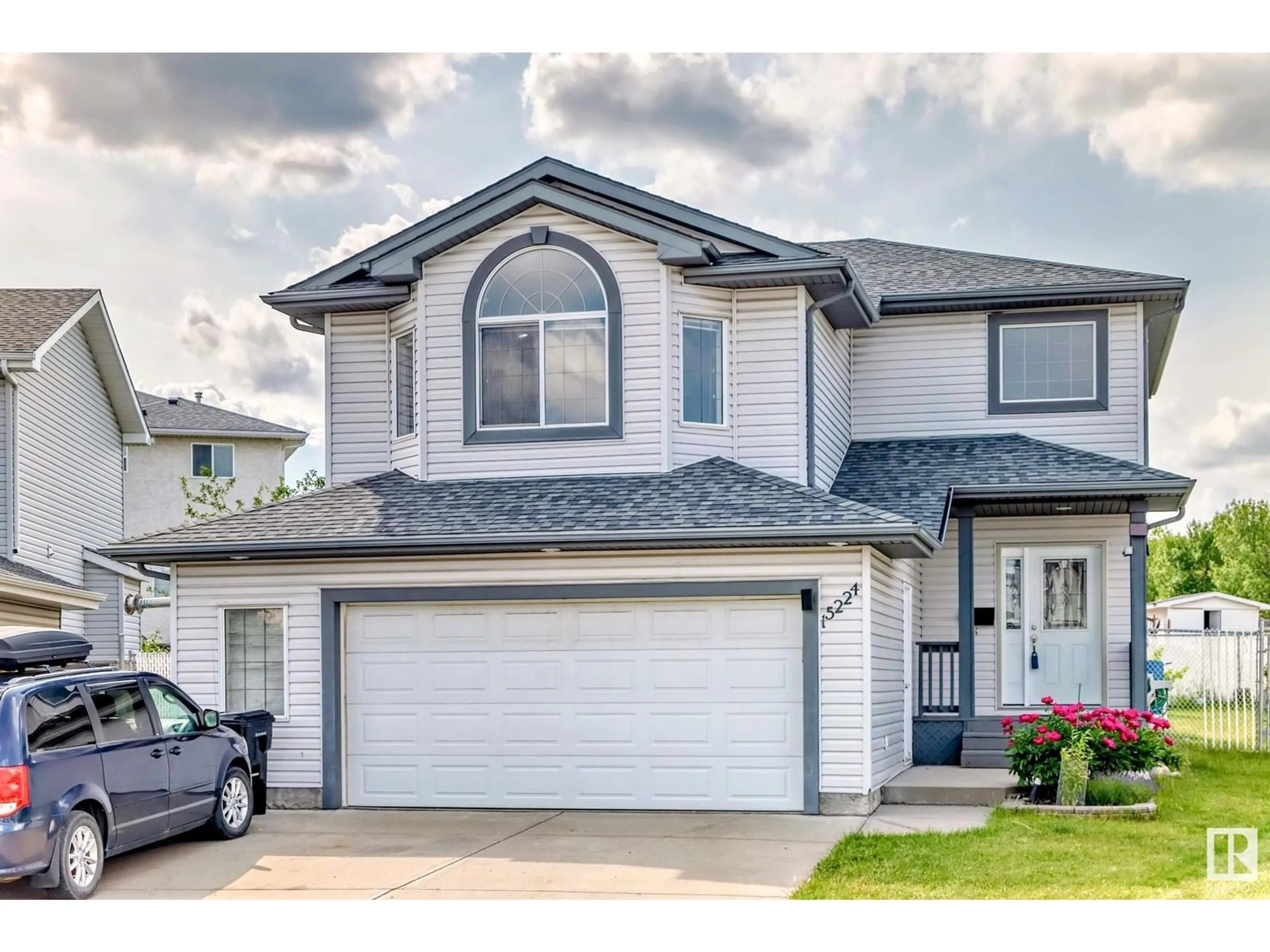 Home with vinyl exterior material, street for NW - 15224 48 ST, Edmonton Alberta T5Y3B8