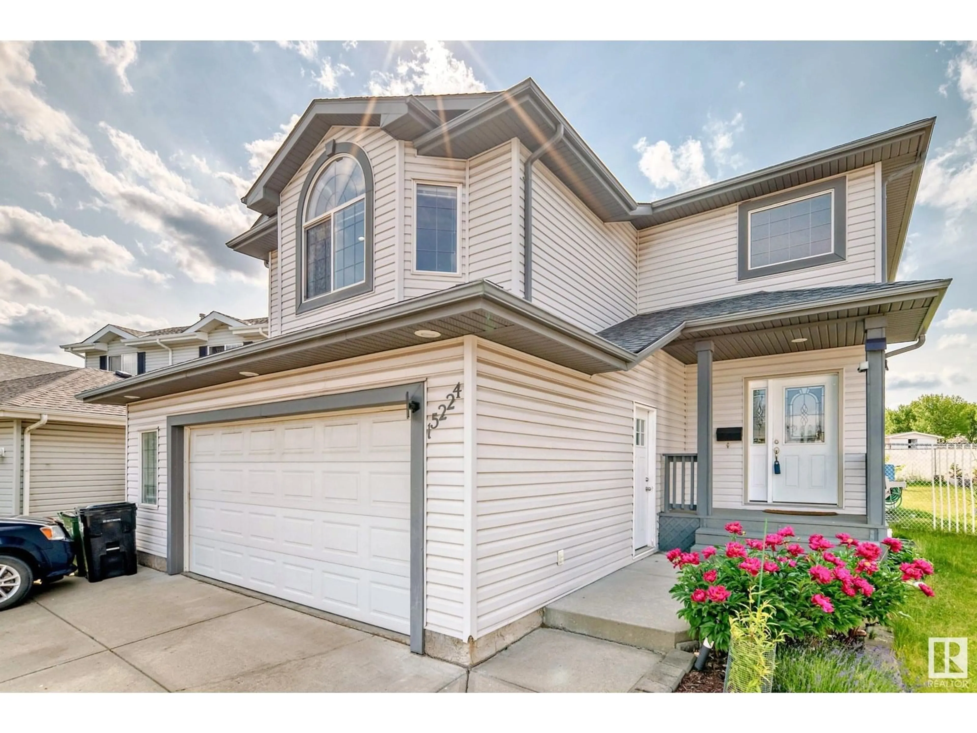 Home with vinyl exterior material, street for NW - 15224 48 ST, Edmonton Alberta T5Y3B8