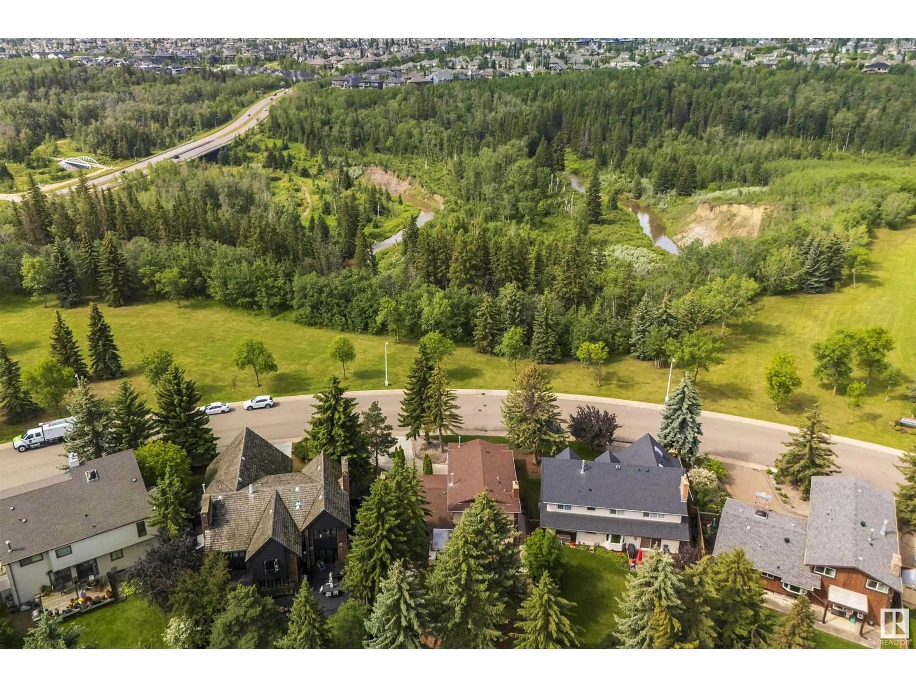 A pic from outside/outdoor area/front of a property/back of a property/a pic from drone, forest/trees view for 2811 125 ST, Edmonton Alberta T6J4G3