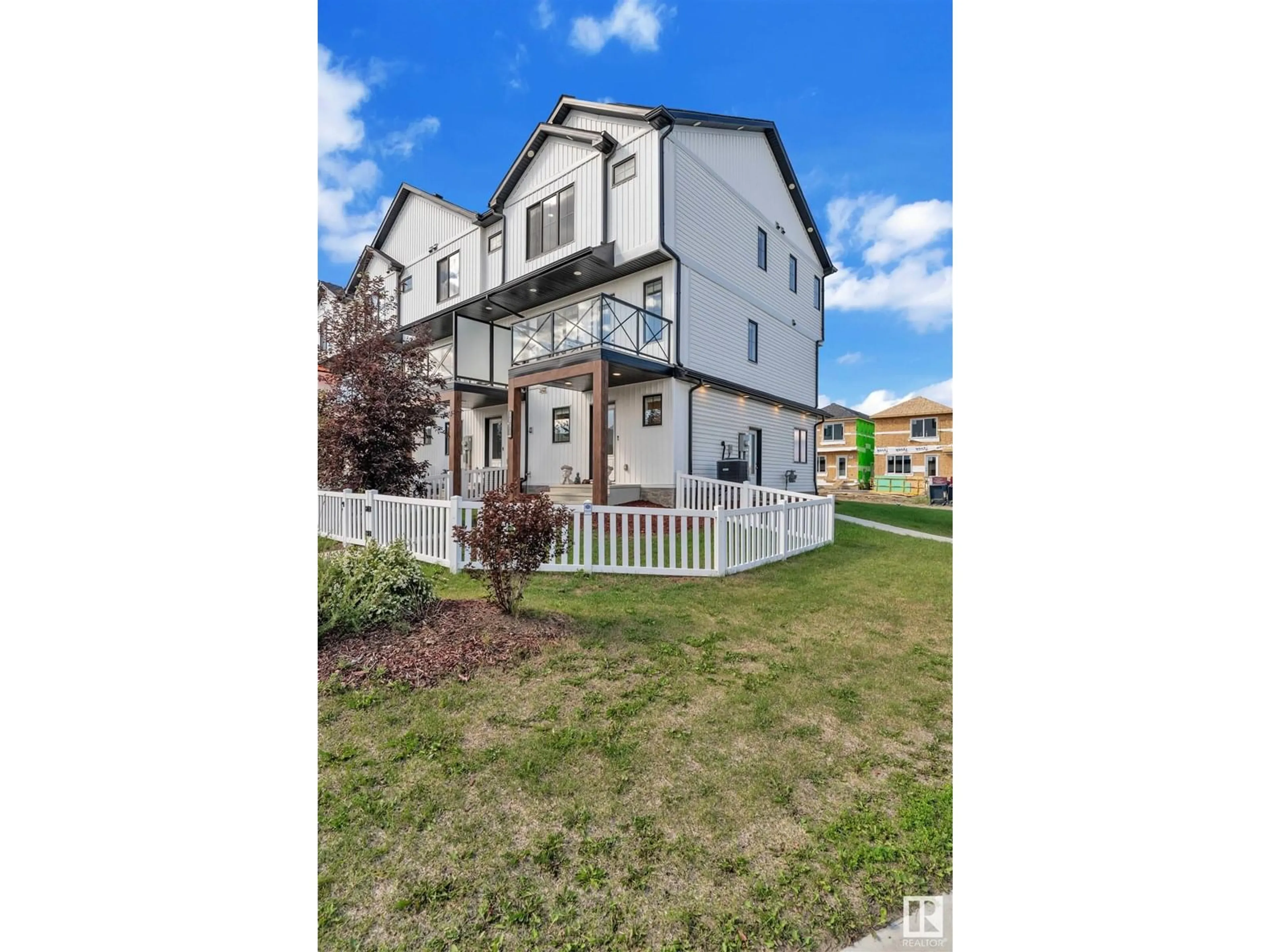 Home with vinyl exterior material, street for 1051 CY BECKER RD, Edmonton Alberta T5Y4B7