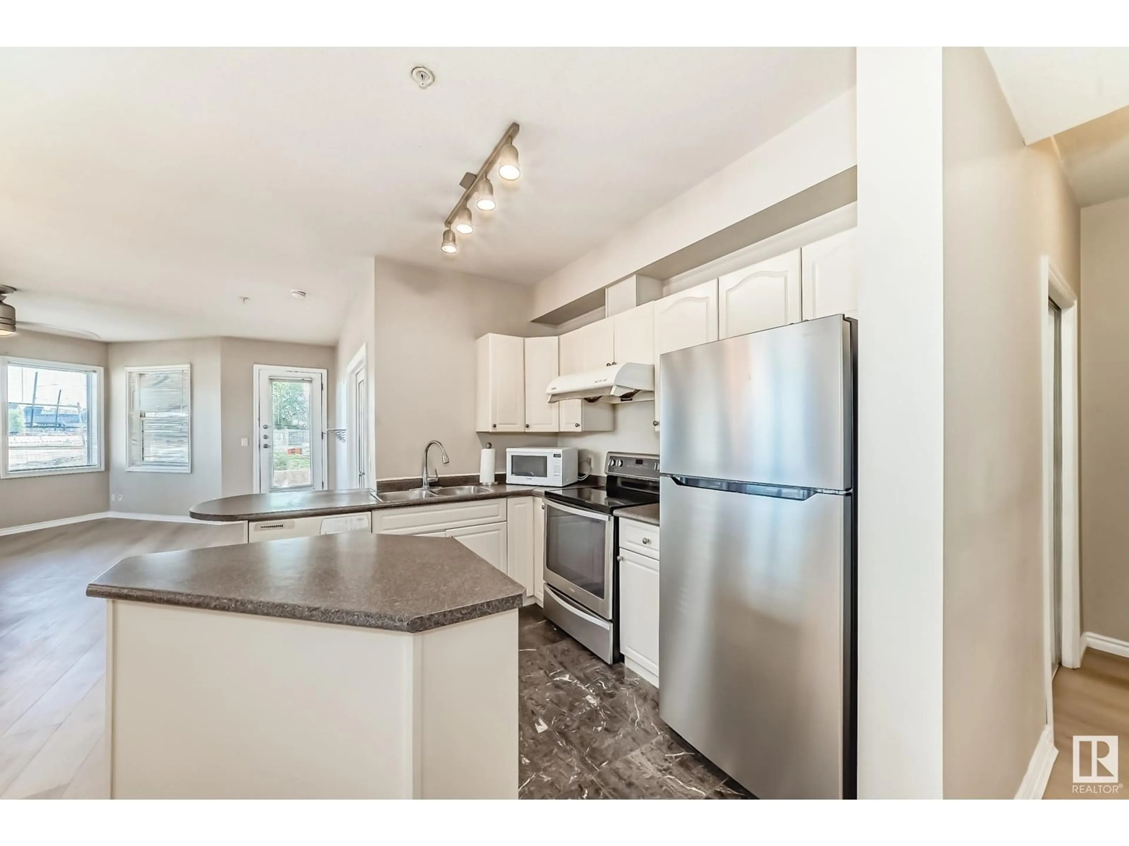 Open concept kitchen, unknown for #101 - 10346 117 ST, Edmonton Alberta T5K2Y7