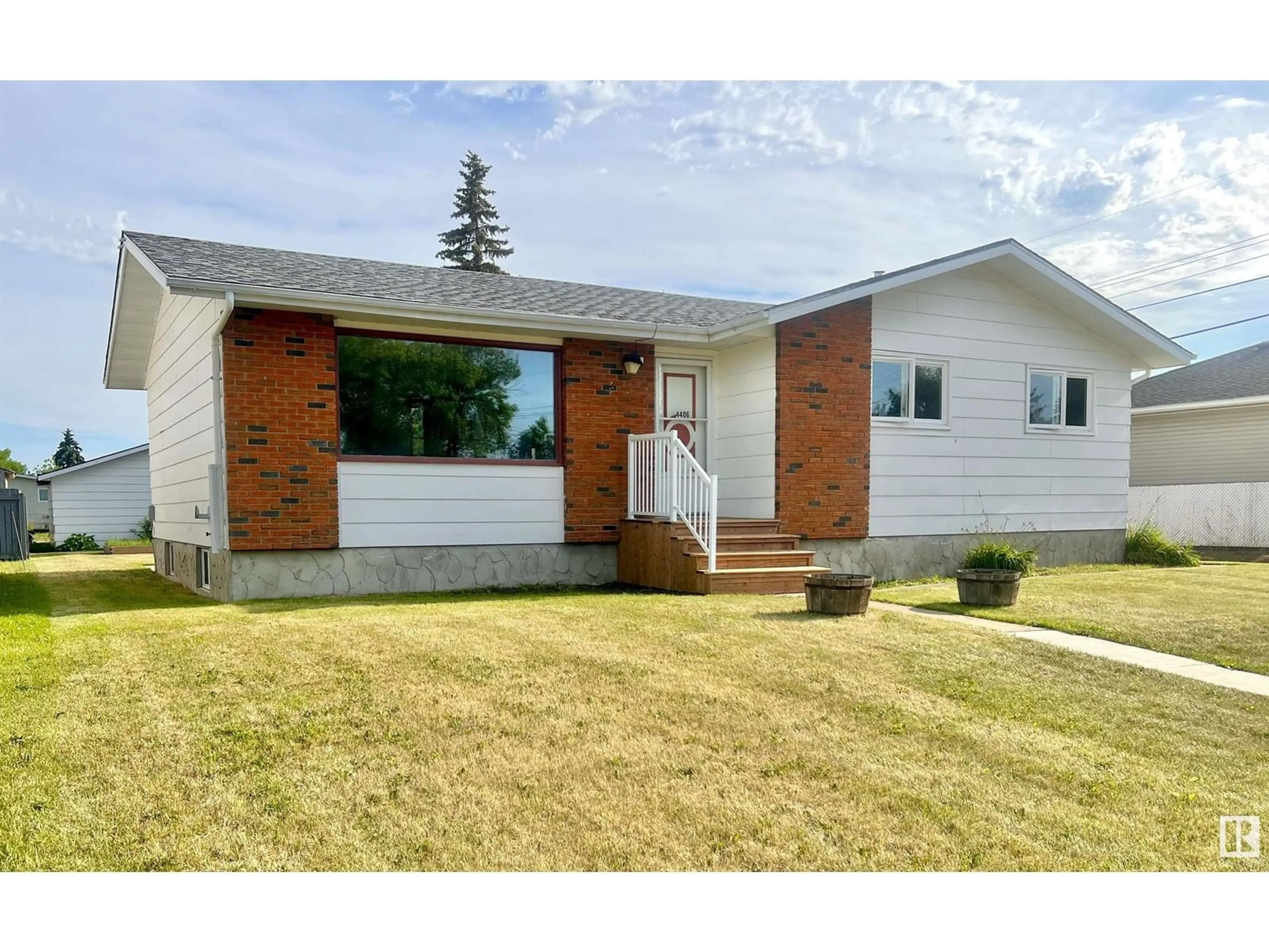 Home with vinyl exterior material, street for 4406 47 AVE, Bonnyville Town Alberta T9N1H3