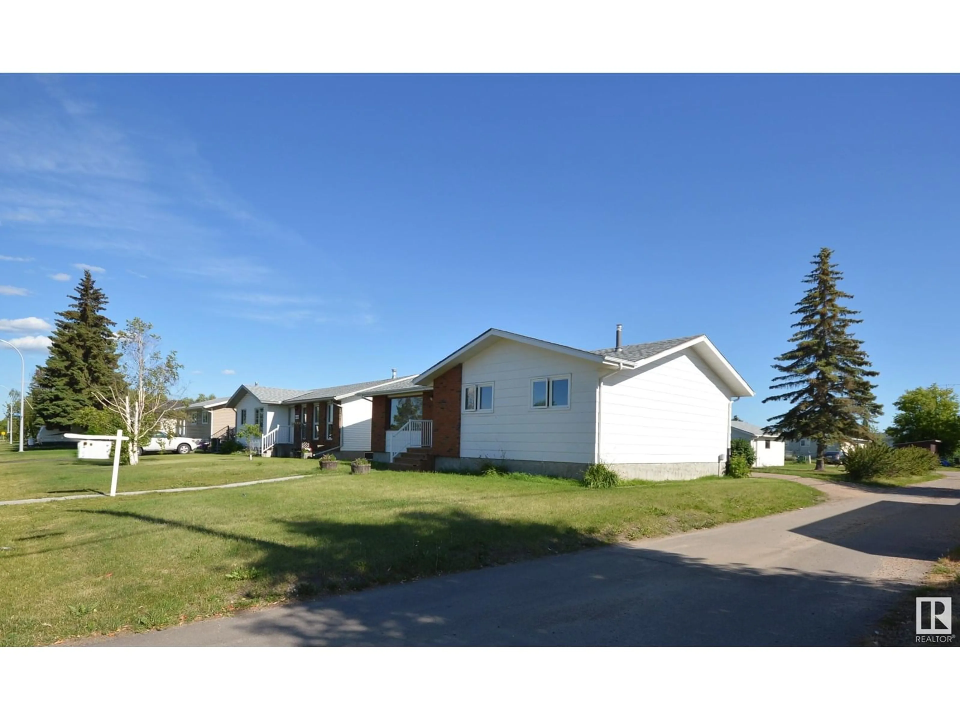 A pic from outside/outdoor area/front of a property/back of a property/a pic from drone, street for 4406 47 AVE, Bonnyville Town Alberta T9N1H3