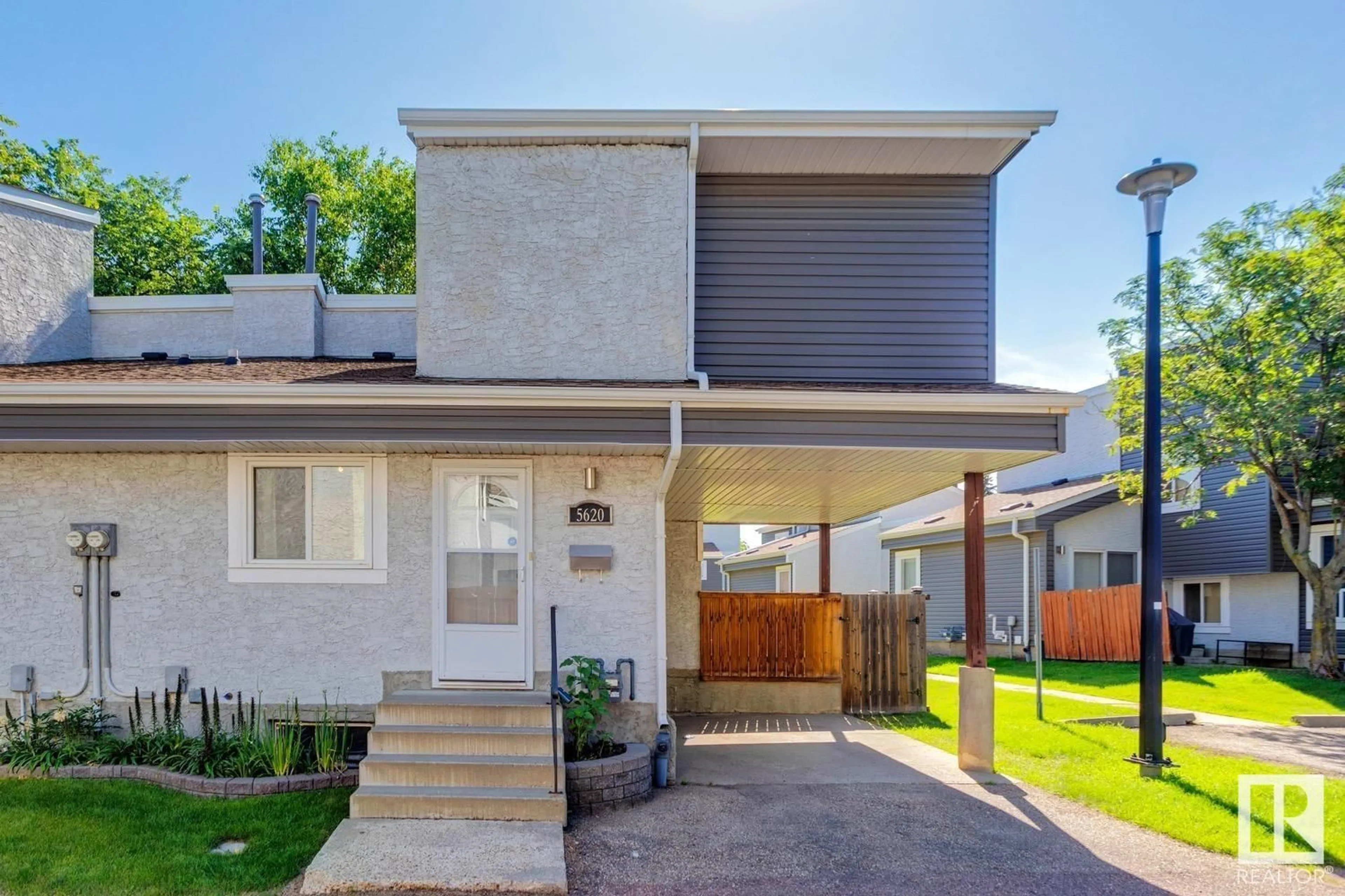 Home with vinyl exterior material, street for 5620 19A AV, Edmonton Alberta T6L2B9