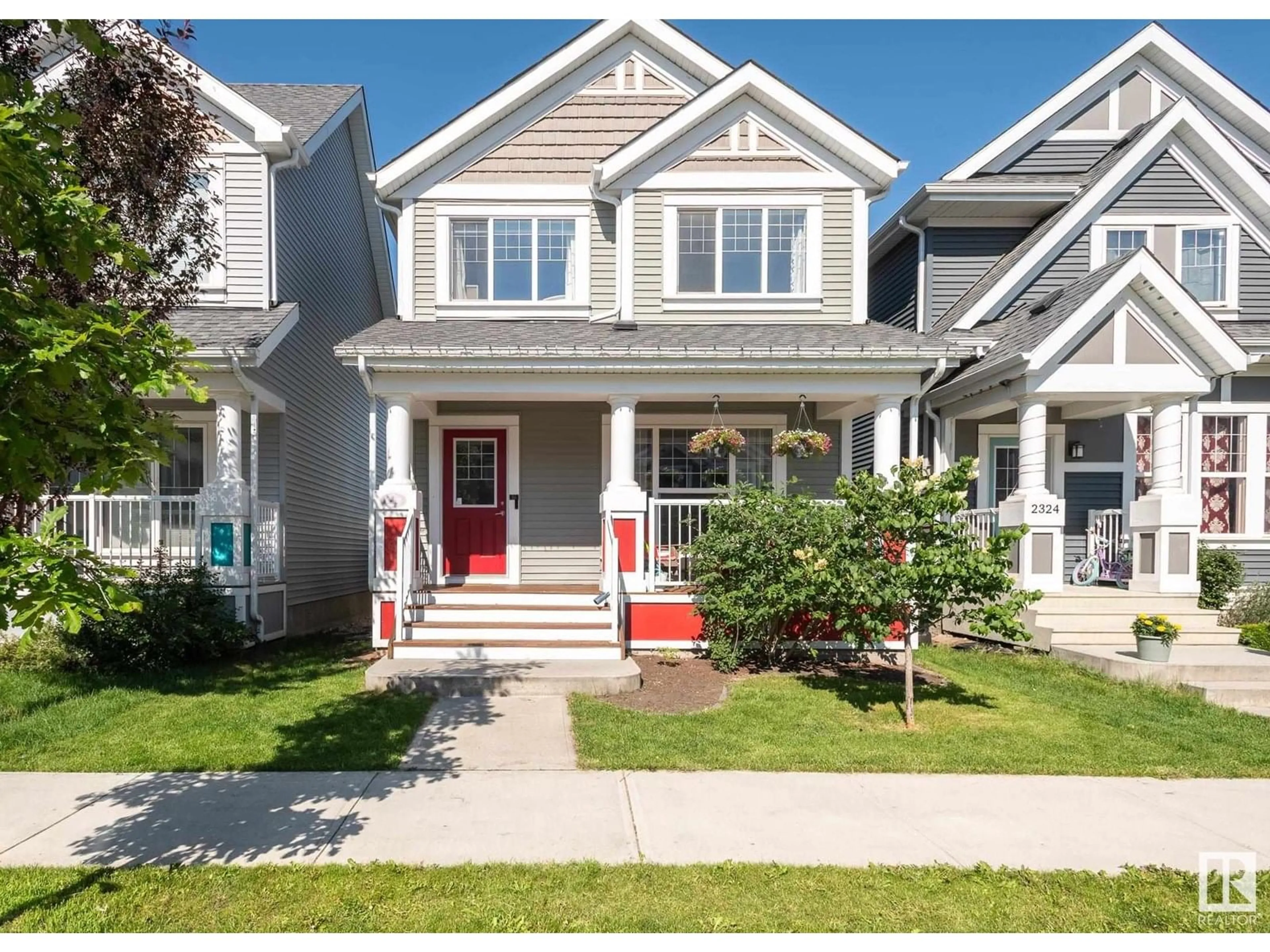 Home with vinyl exterior material, street for 2328 82 ST, Edmonton Alberta T6X2J7