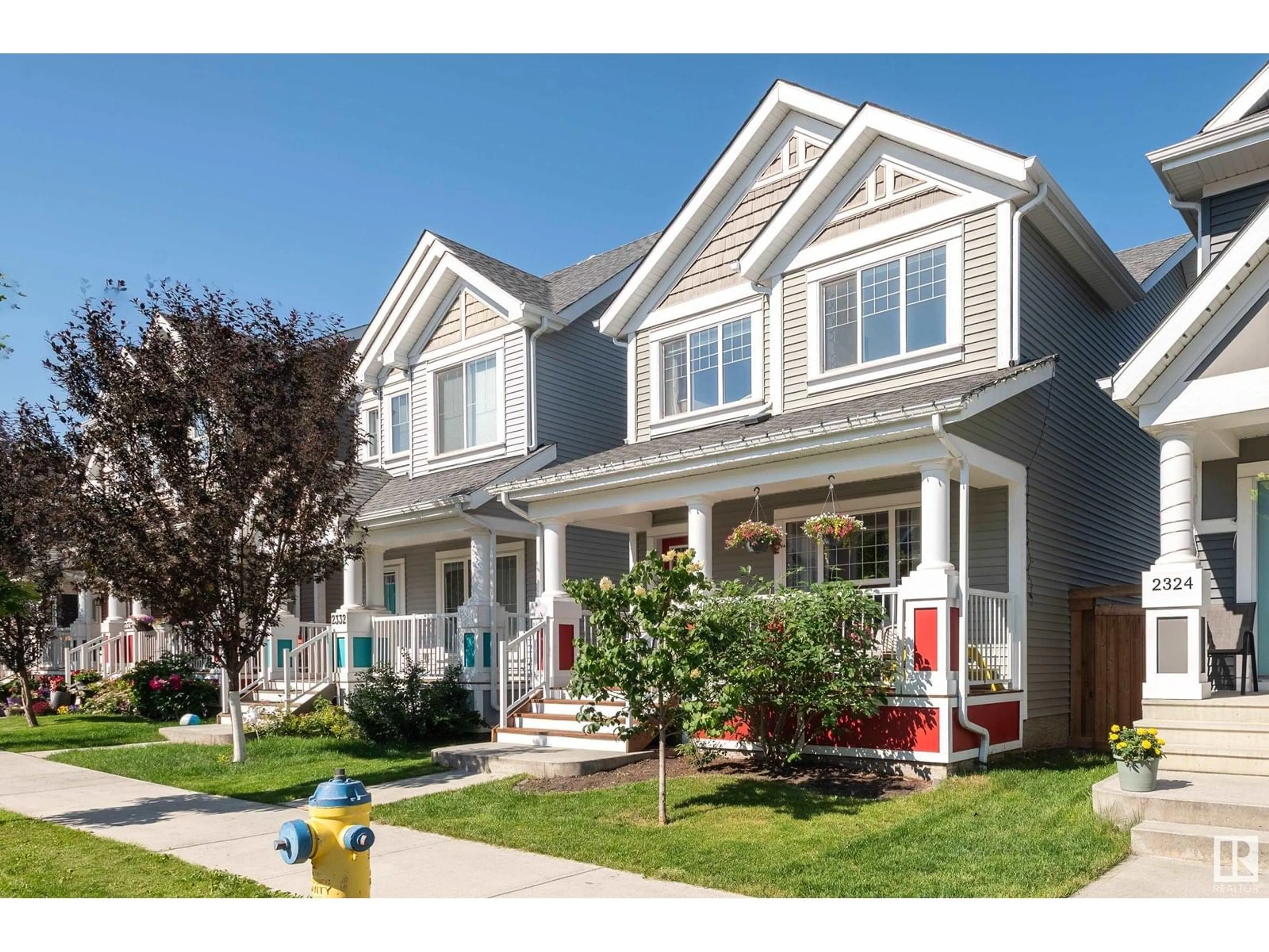 Home with vinyl exterior material, street for 2328 82 ST, Edmonton Alberta T6X2J7