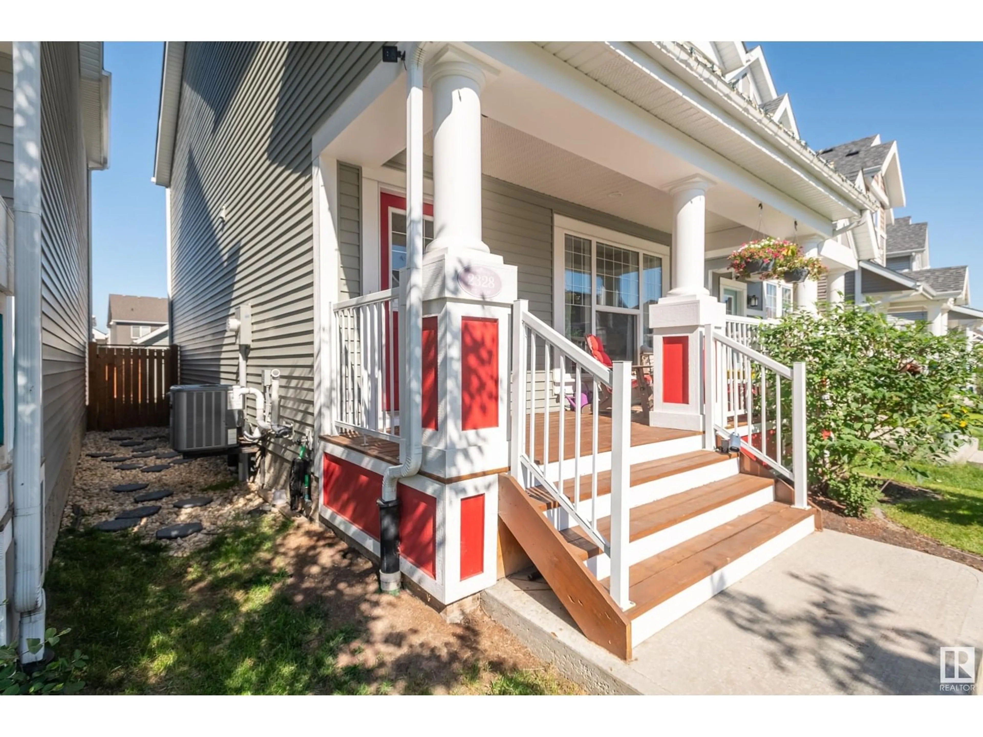 Home with vinyl exterior material, street for 2328 82 ST, Edmonton Alberta T6X2J7