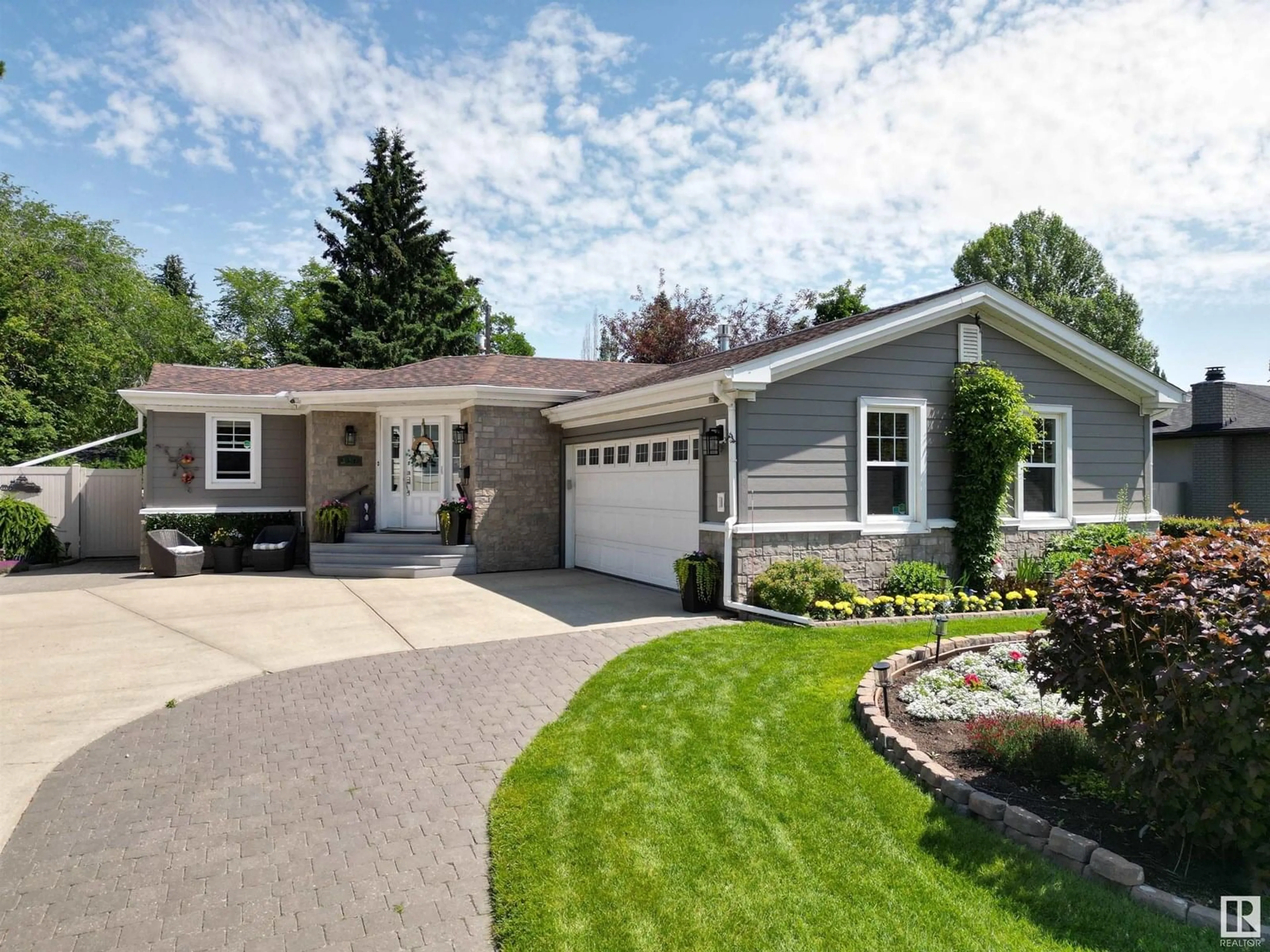 Home with vinyl exterior material, street for 157 LAURIER DR, Edmonton Alberta T5R2P9