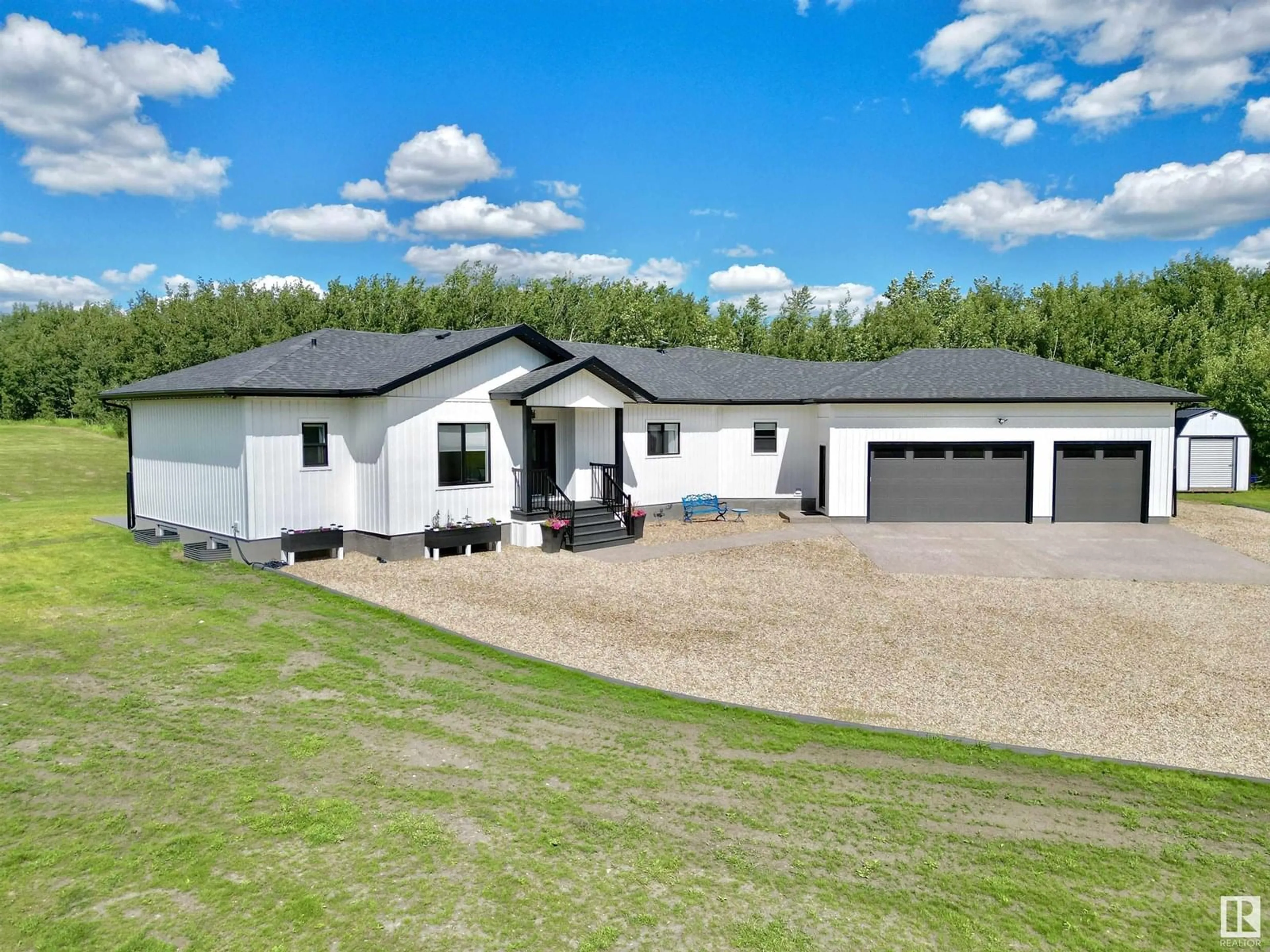 A pic from outside/outdoor area/front of a property/back of a property/a pic from drone, unknown for 50072 - 197 RANGE ROAD 205, Rural Camrose County Alberta T0B2M1