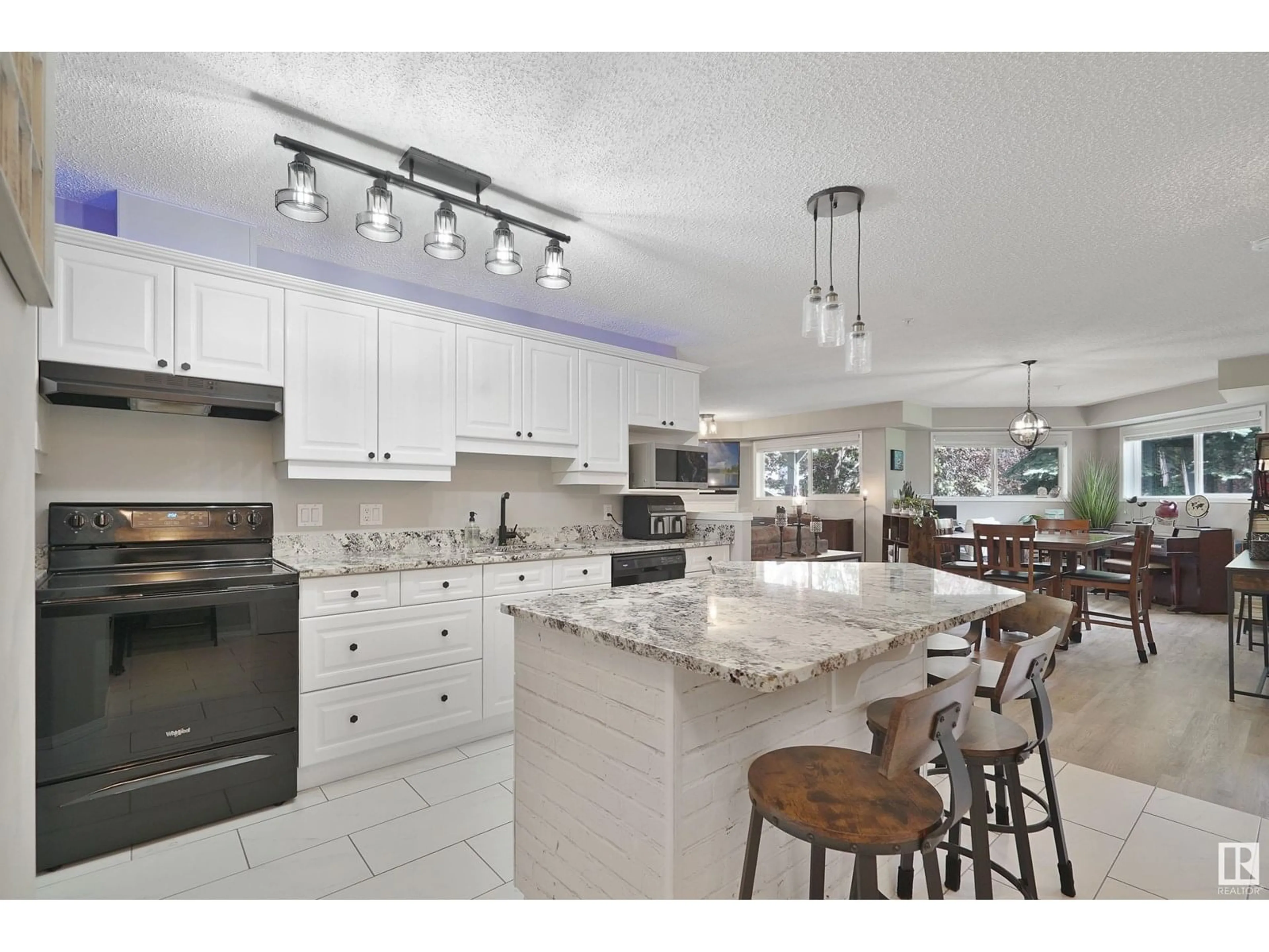 Open concept kitchen, ceramic/tile floor for #109 - 10221 111 ST, Edmonton Alberta T5K2W5