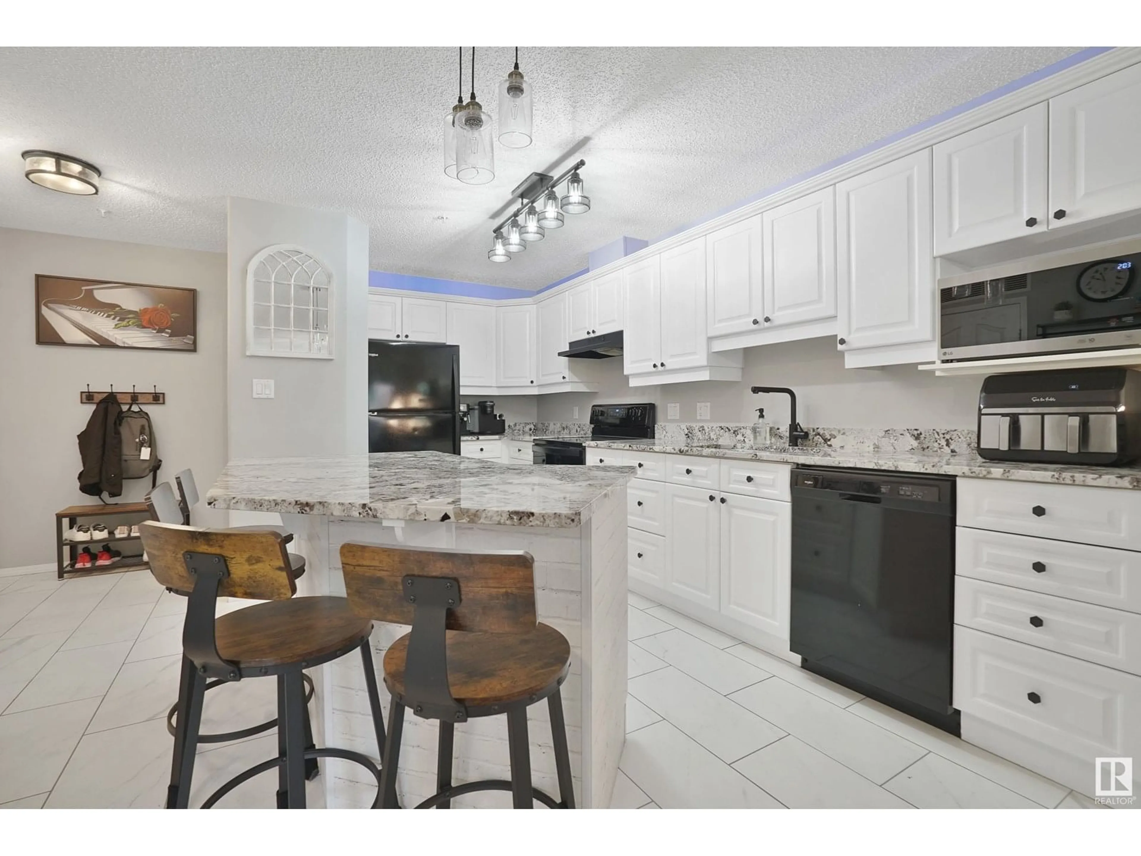Open concept kitchen, ceramic/tile floor for #109 - 10221 111 ST, Edmonton Alberta T5K2W5