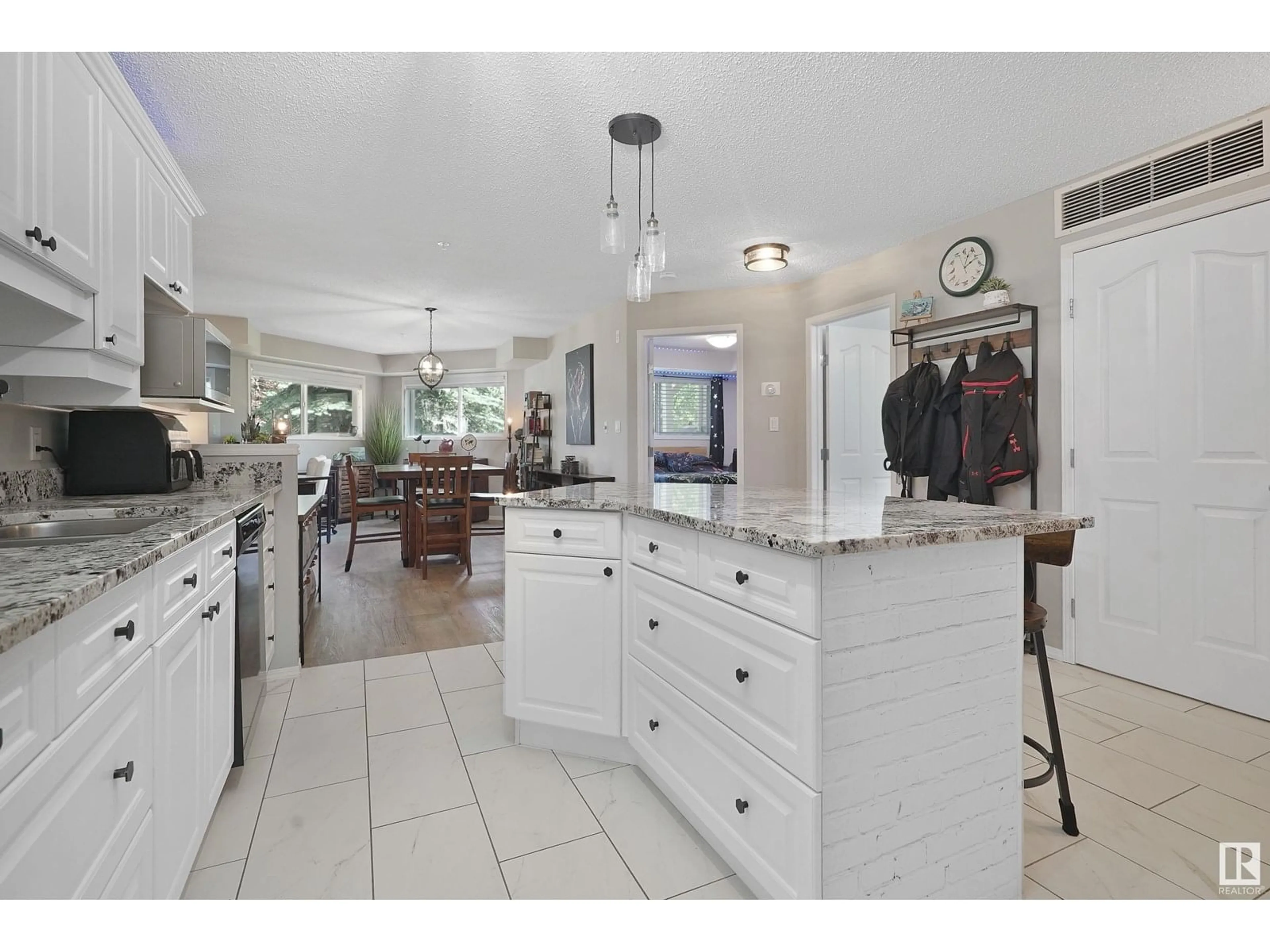 Open concept kitchen, ceramic/tile floor for #109 - 10221 111 ST, Edmonton Alberta T5K2W5