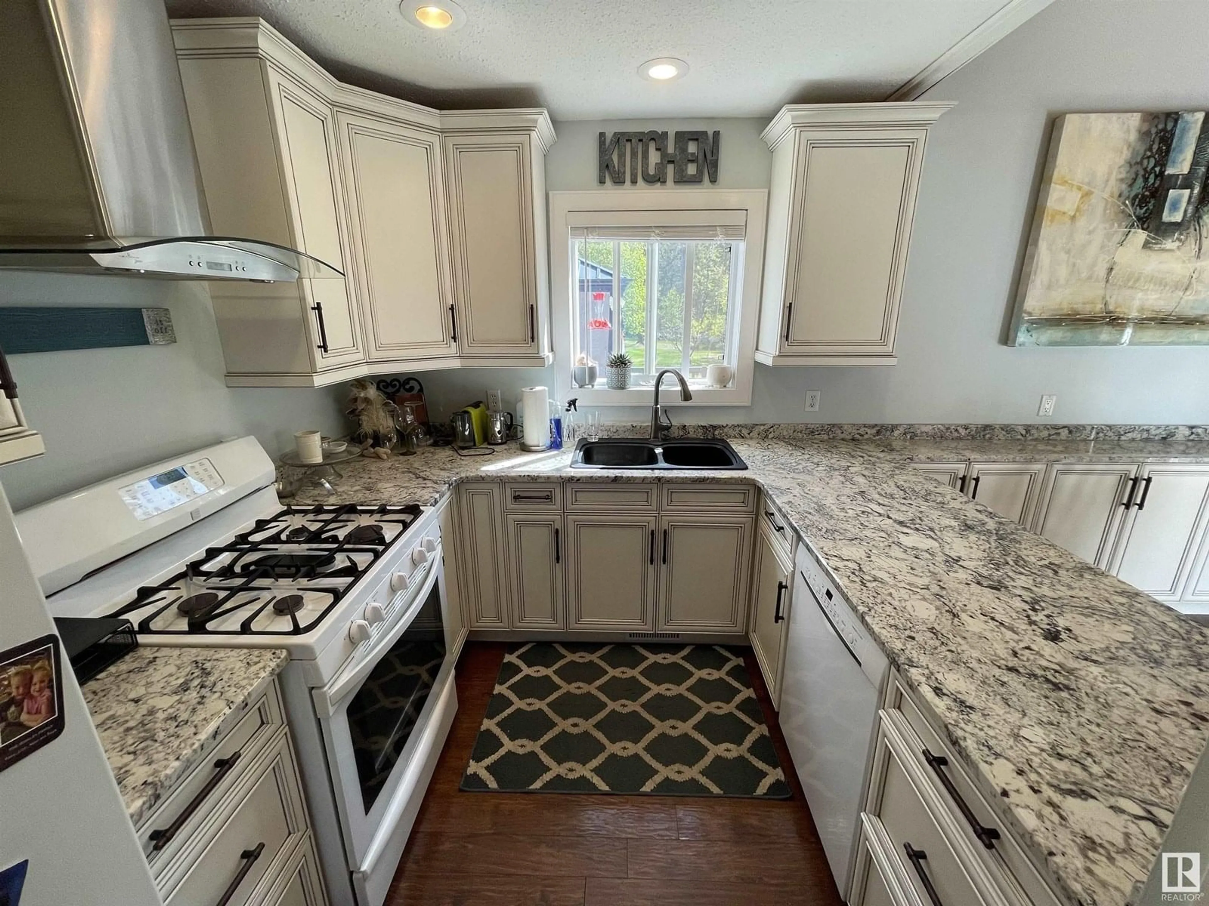 Open concept kitchen, ceramic/tile floor for #16 - 61223 RGE RD 470, Rural Bonnyville M.D. Alberta T9N2J6