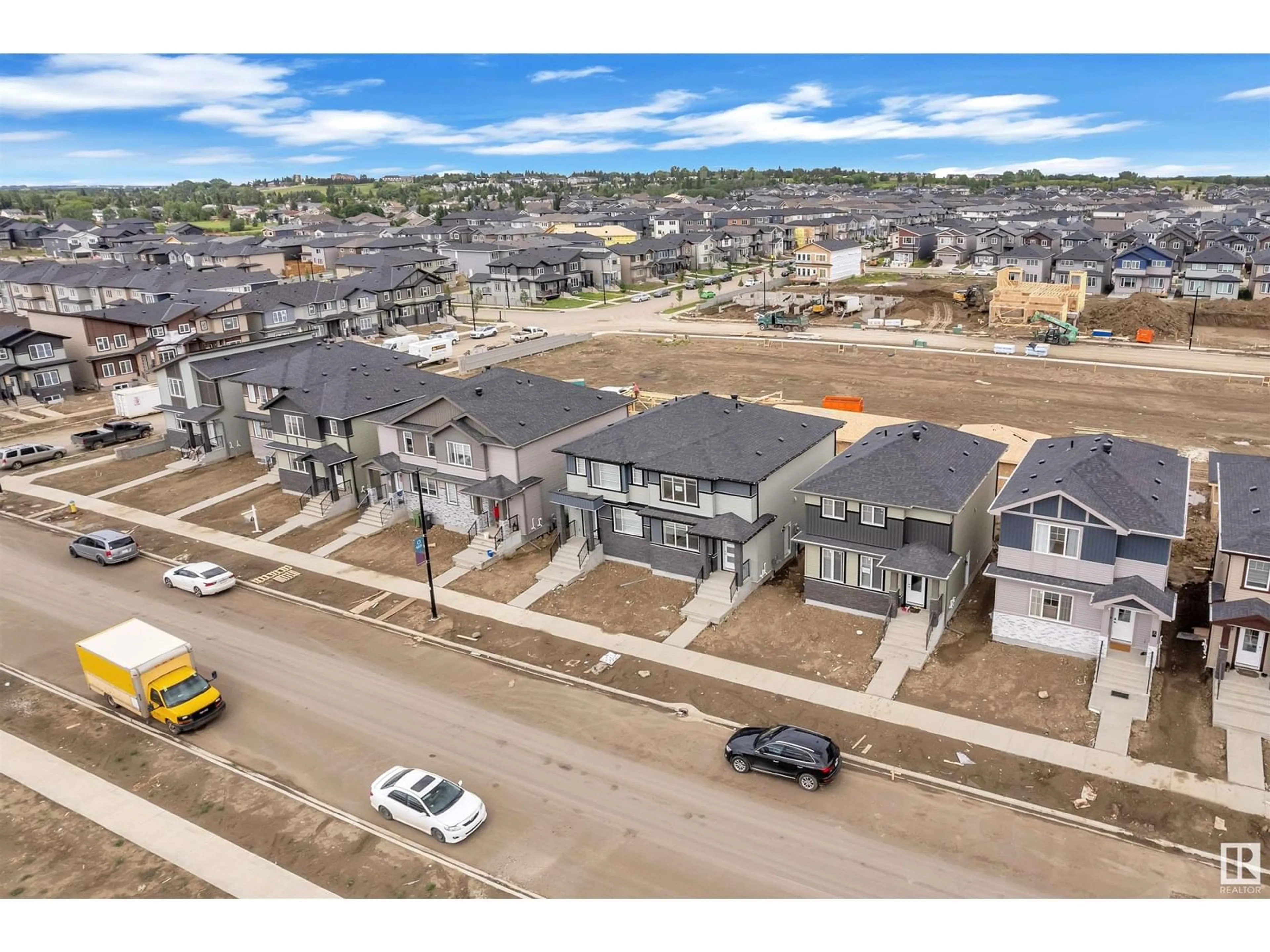 A pic from outside/outdoor area/front of a property/back of a property/a pic from drone, street for 3720 39 AV, Beaumont Alberta T4X2C5