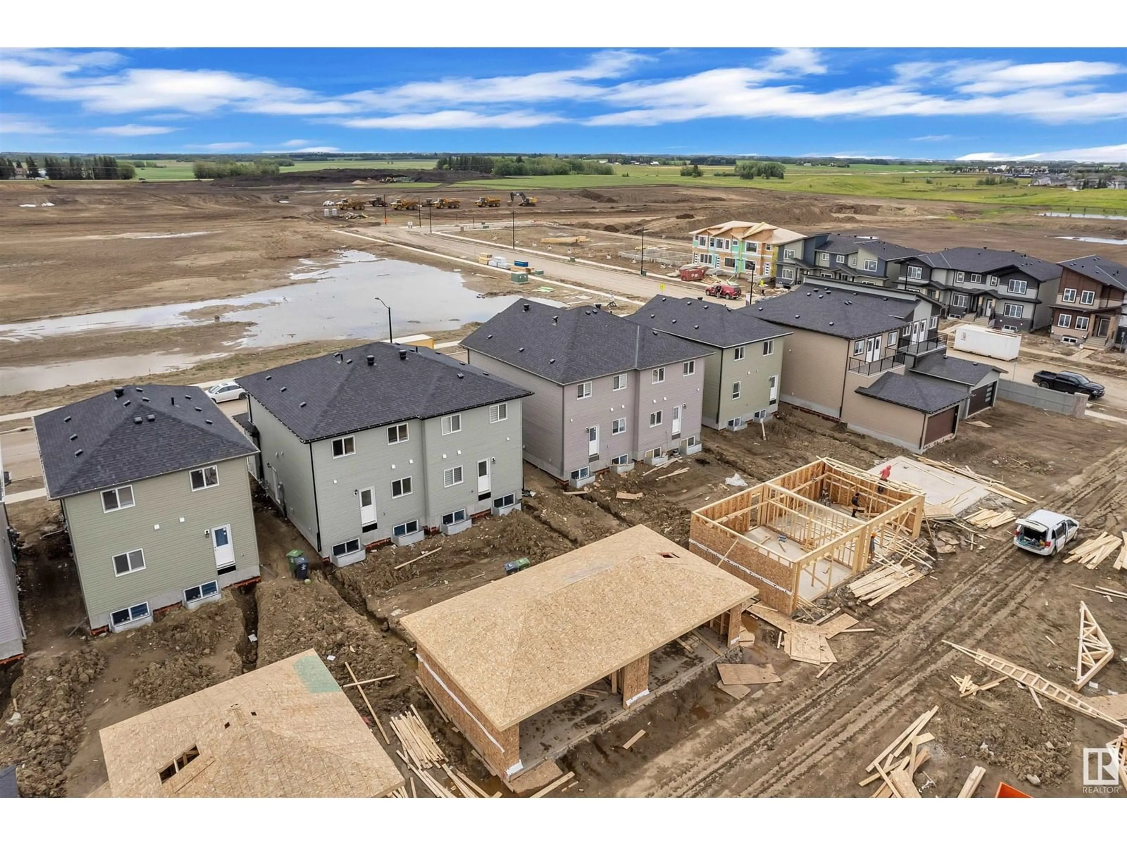 A pic from outside/outdoor area/front of a property/back of a property/a pic from drone, building for 3720 39 AV, Beaumont Alberta T4X2C5