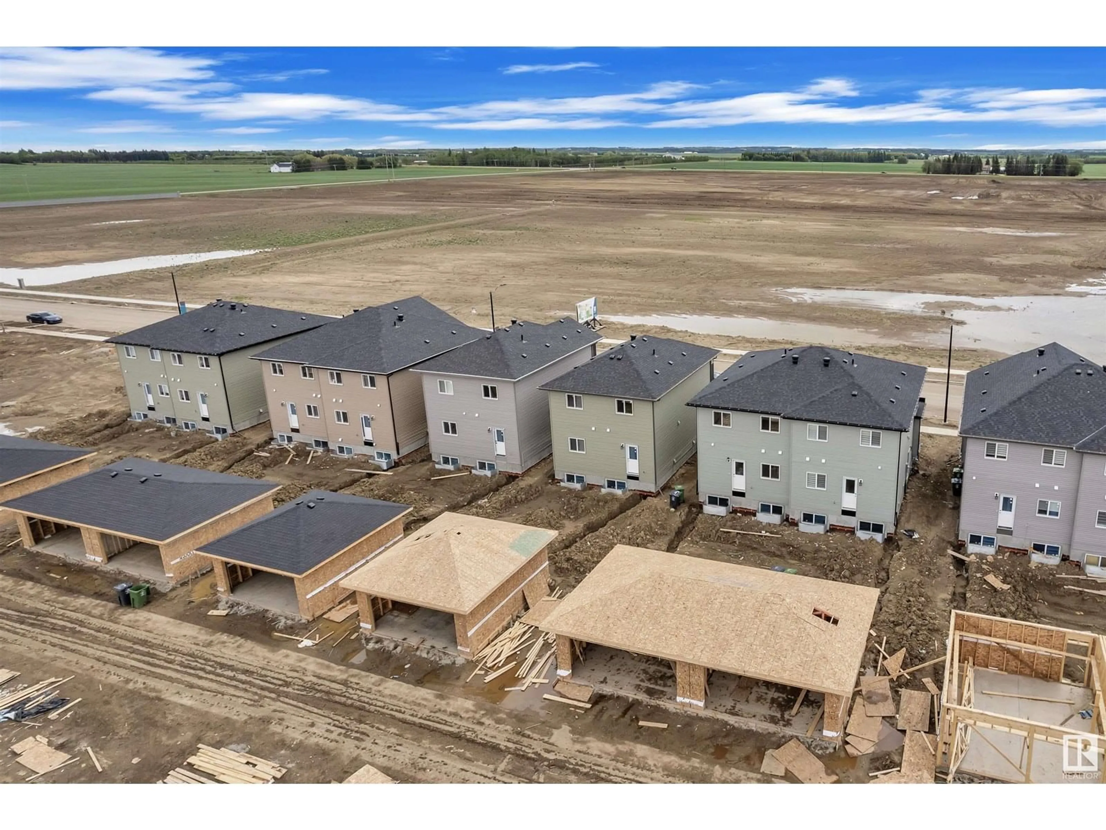 A pic from outside/outdoor area/front of a property/back of a property/a pic from drone, building for 3720 39 AV, Beaumont Alberta T4X2C5