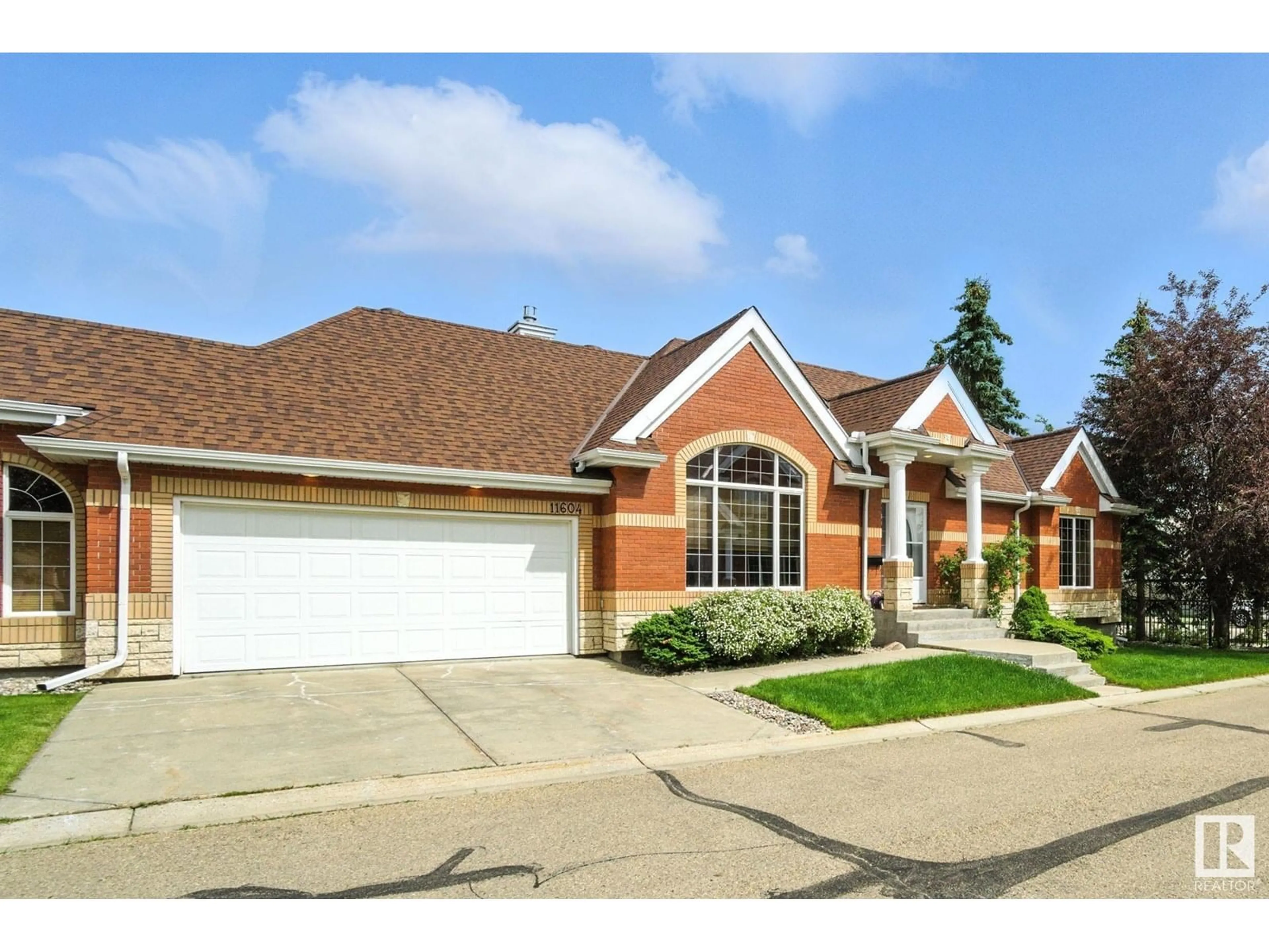 Home with brick exterior material, street for 11604 15 AV, Edmonton Alberta T6J7H9