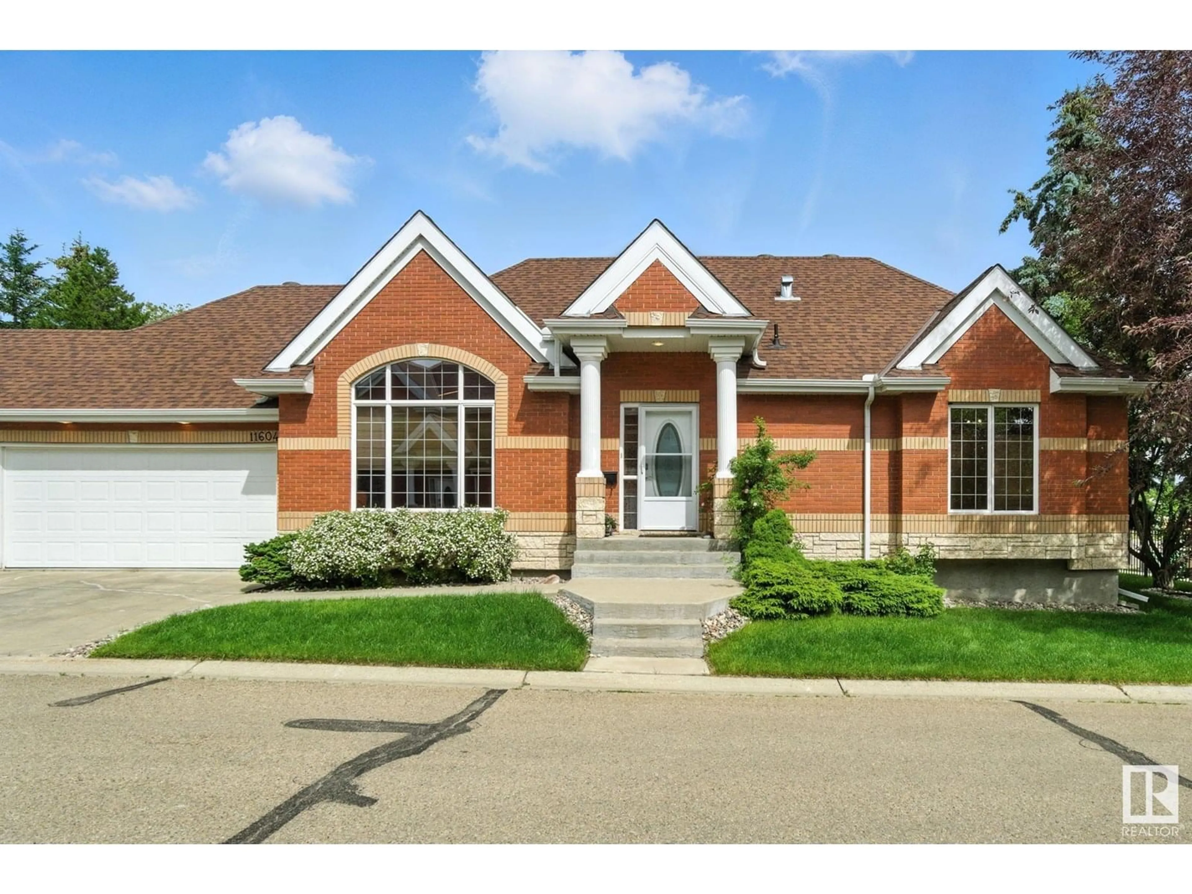 Home with brick exterior material, street for 11604 15 AV, Edmonton Alberta T6J7H9