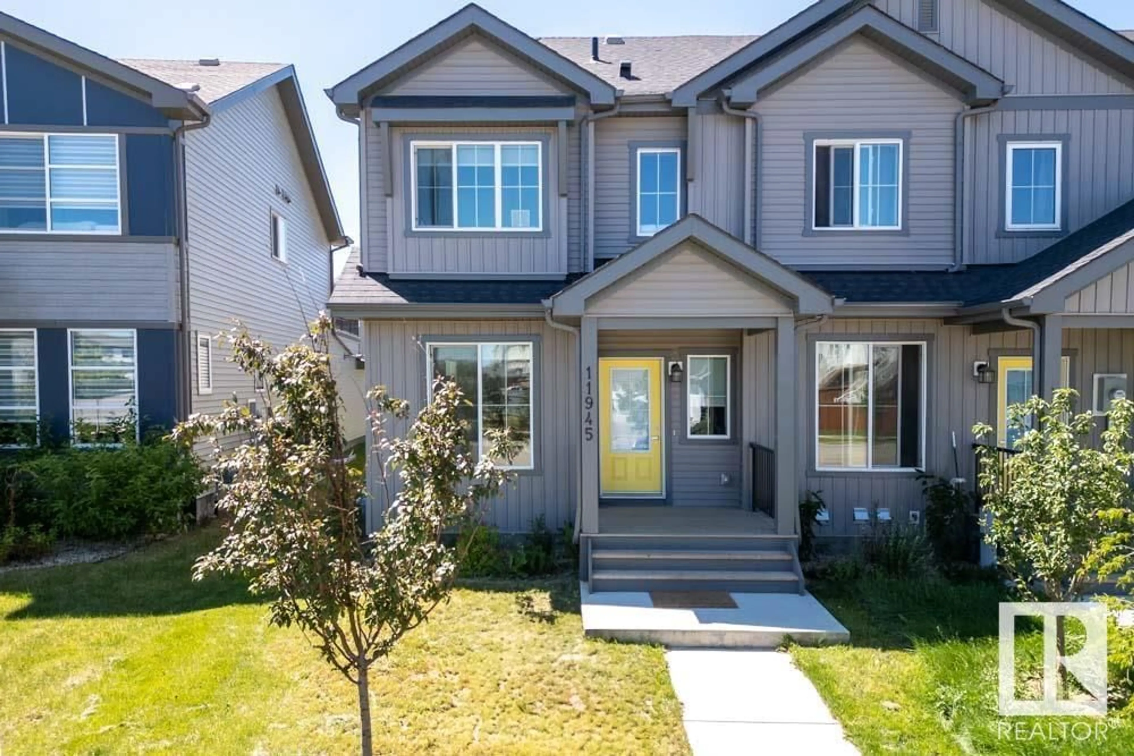 Home with vinyl exterior material, street for SW - 11945 35 AV, Edmonton Alberta T6W4V3
