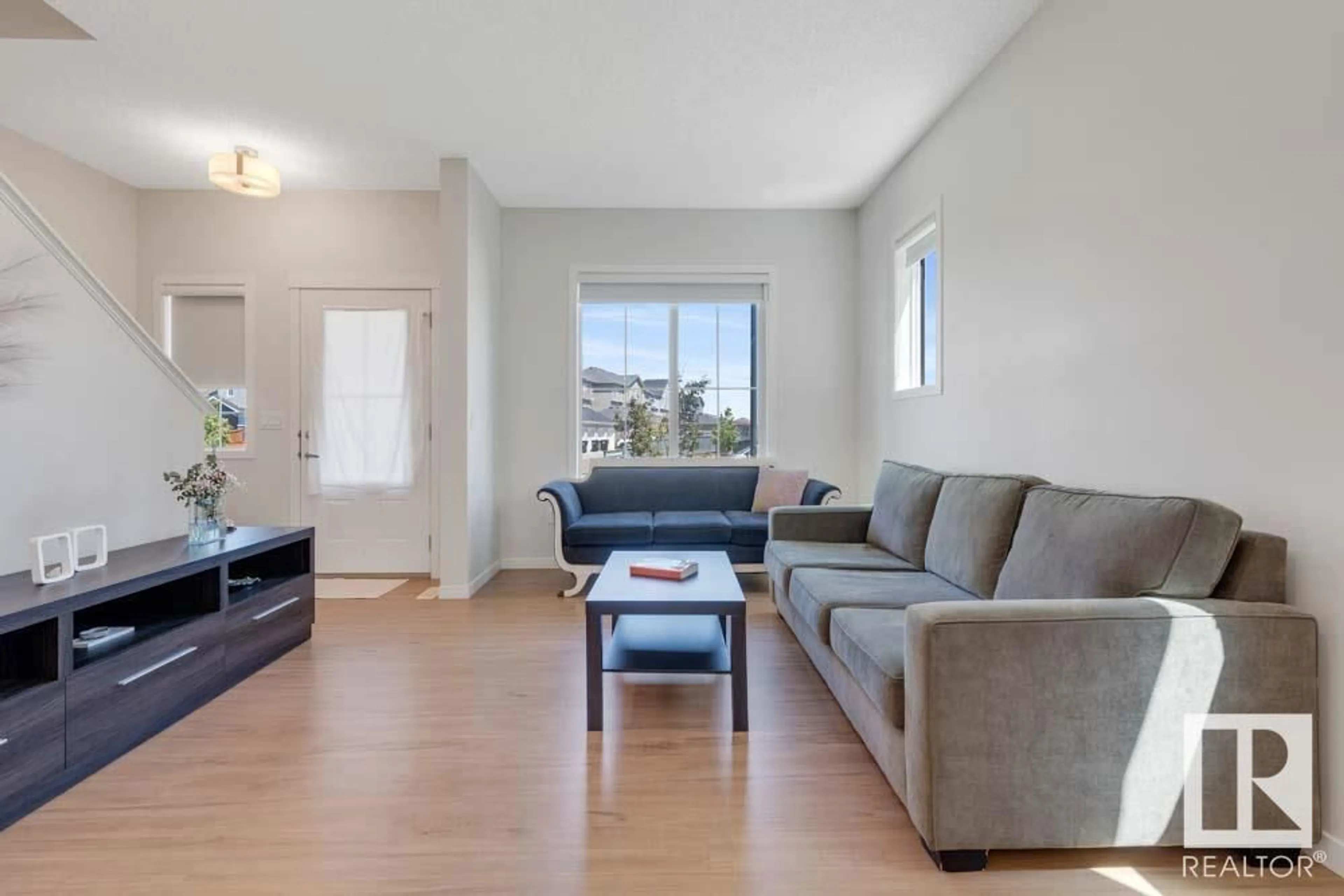 Living room with furniture, unknown for SW - 11945 35 AV, Edmonton Alberta T6W4V3