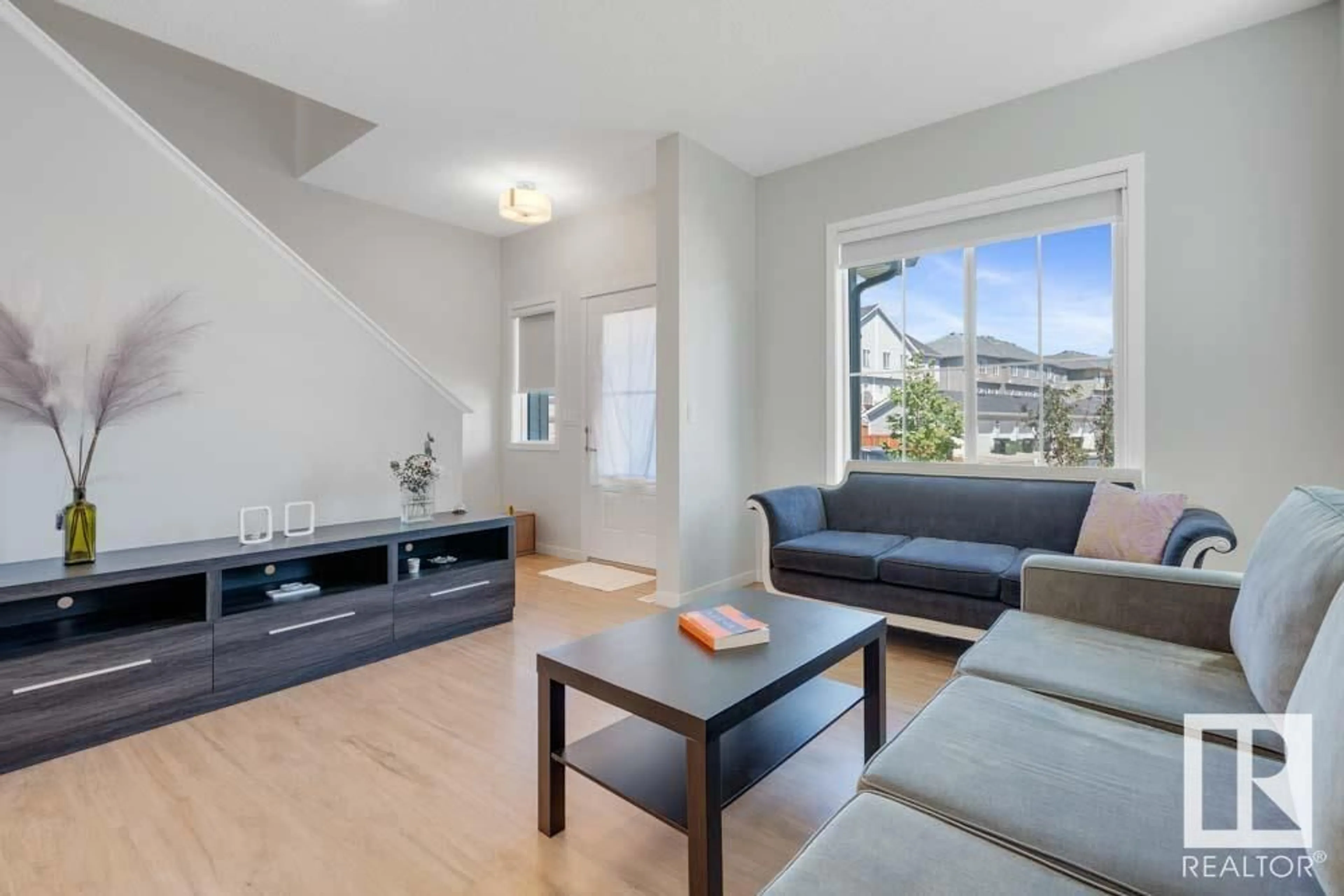 Living room with furniture, unknown for SW - 11945 35 AV, Edmonton Alberta T6W4V3