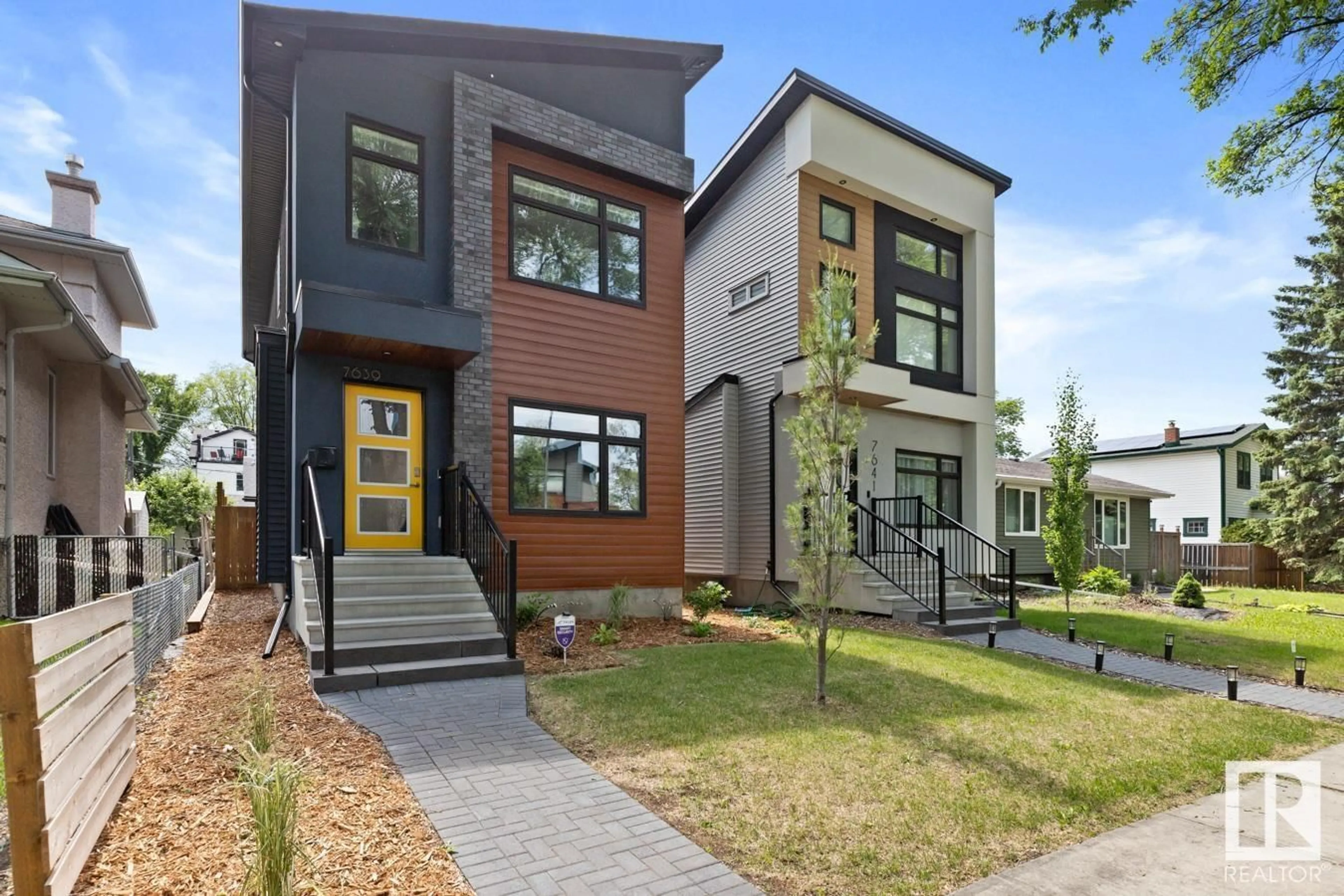 Home with brick exterior material, street for 7639 92 AV, Edmonton Alberta T6C1R3