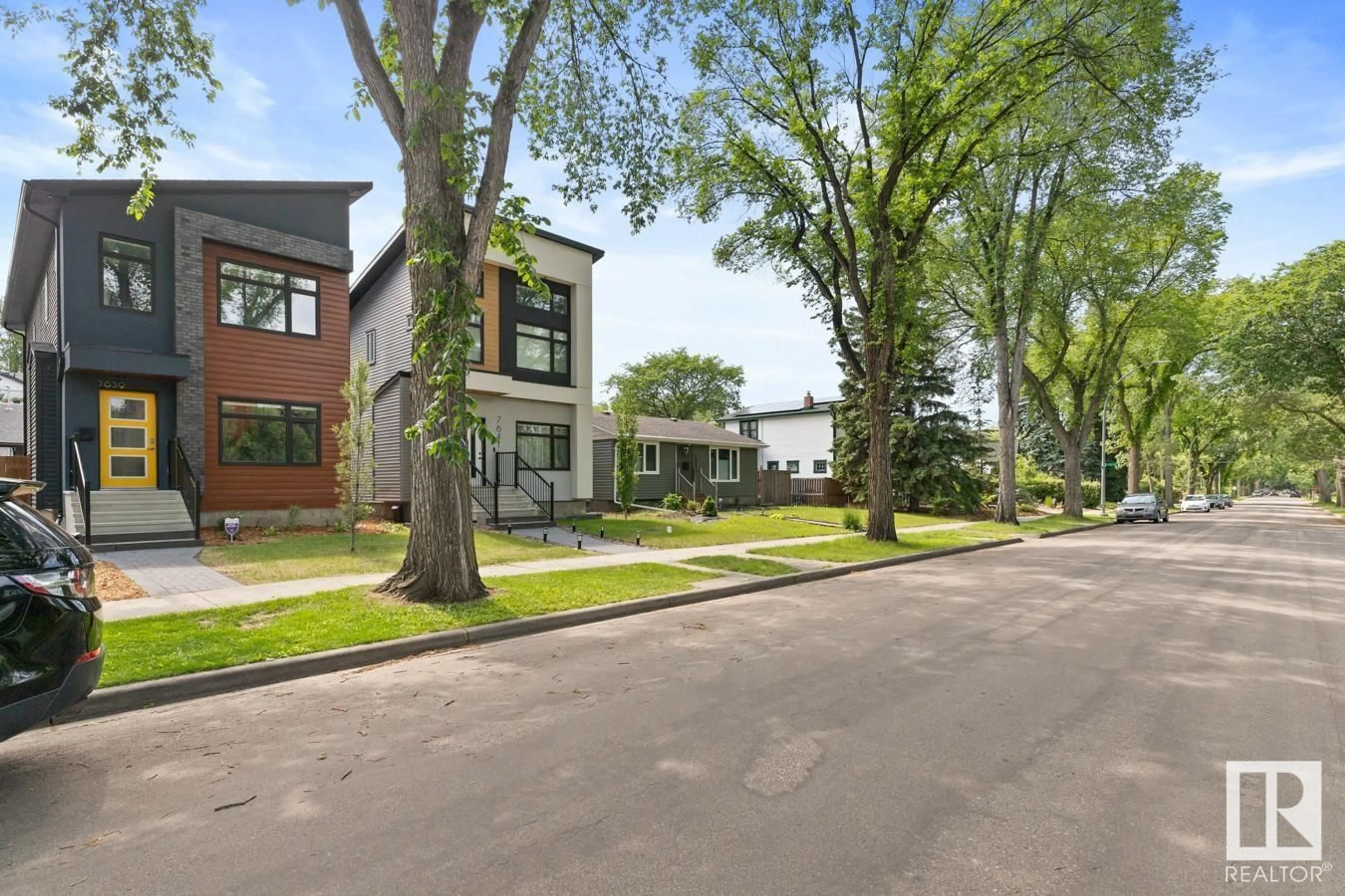 Home with brick exterior material, street for 7639 92 AV, Edmonton Alberta T6C1R3
