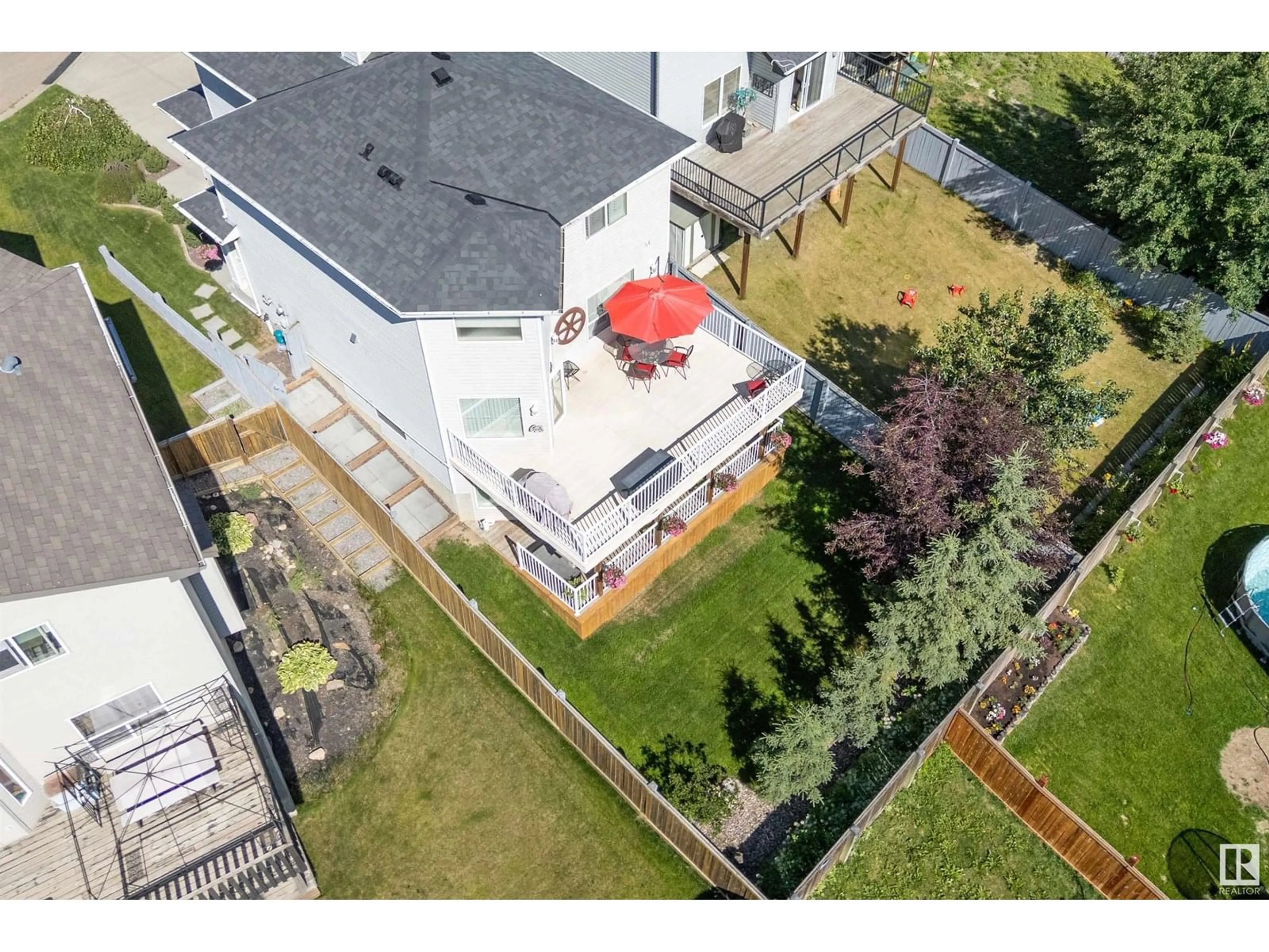 A pic from outside/outdoor area/front of a property/back of a property/a pic from drone, unknown for 68 GREYSTONE CR, Spruce Grove Alberta T7X0A7